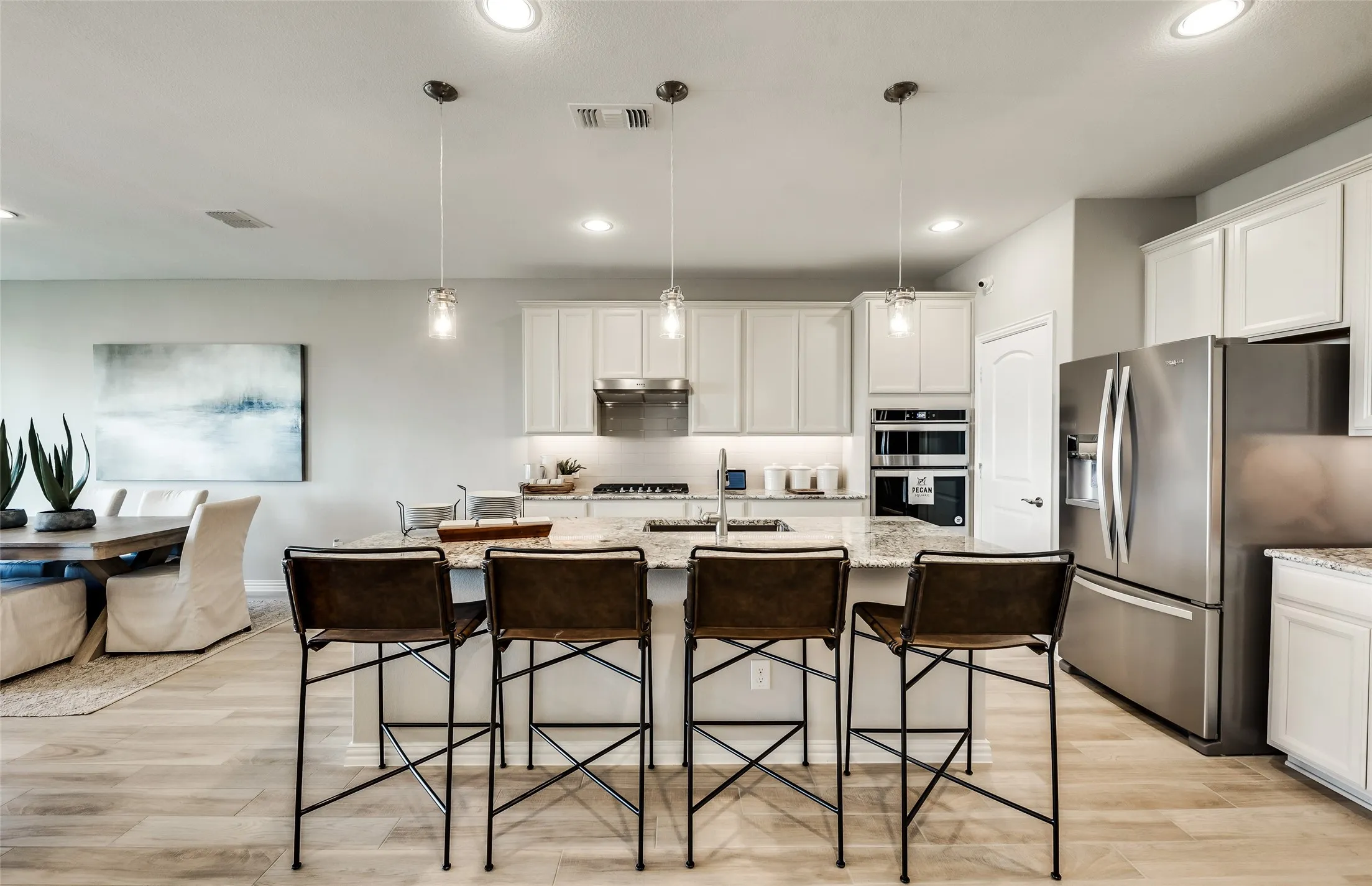 *Model Representation - Spacious kitchen with eat-in bartop island