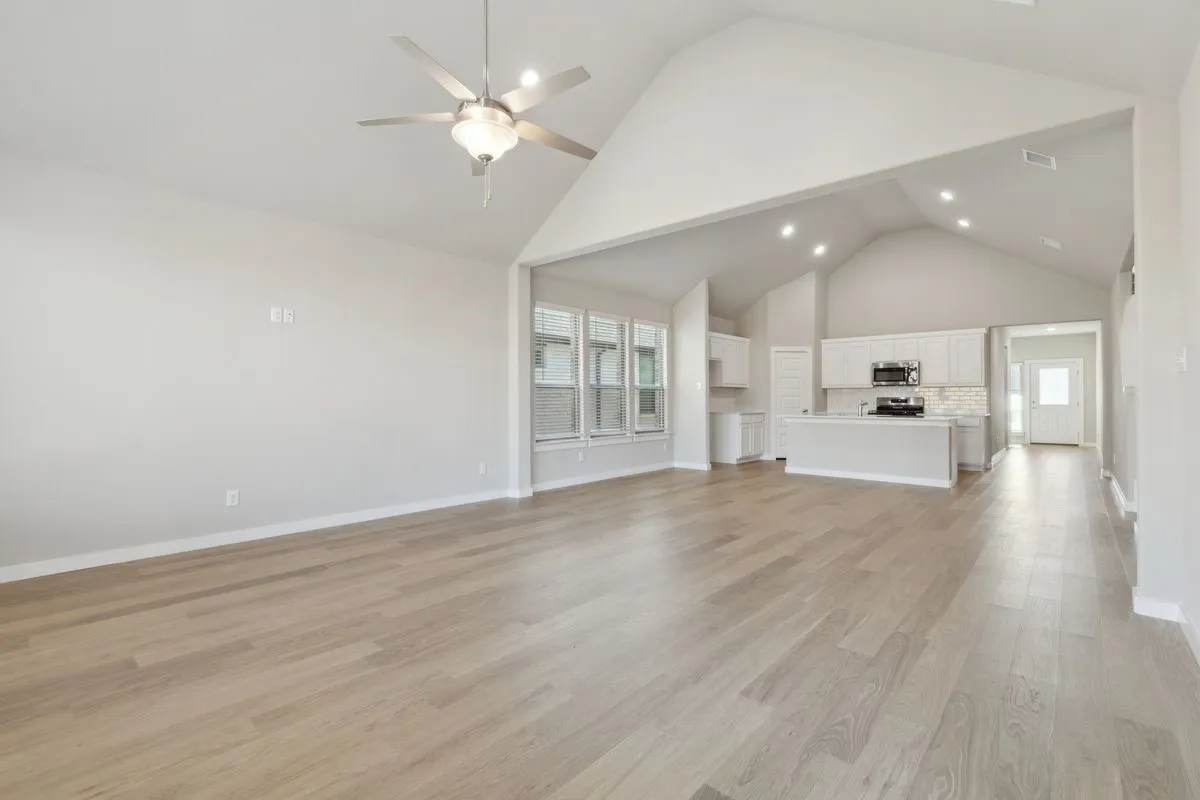 Living Room in the Claret home plan by Trophy Signature Homes – REPRESENTATIVE PHOTO