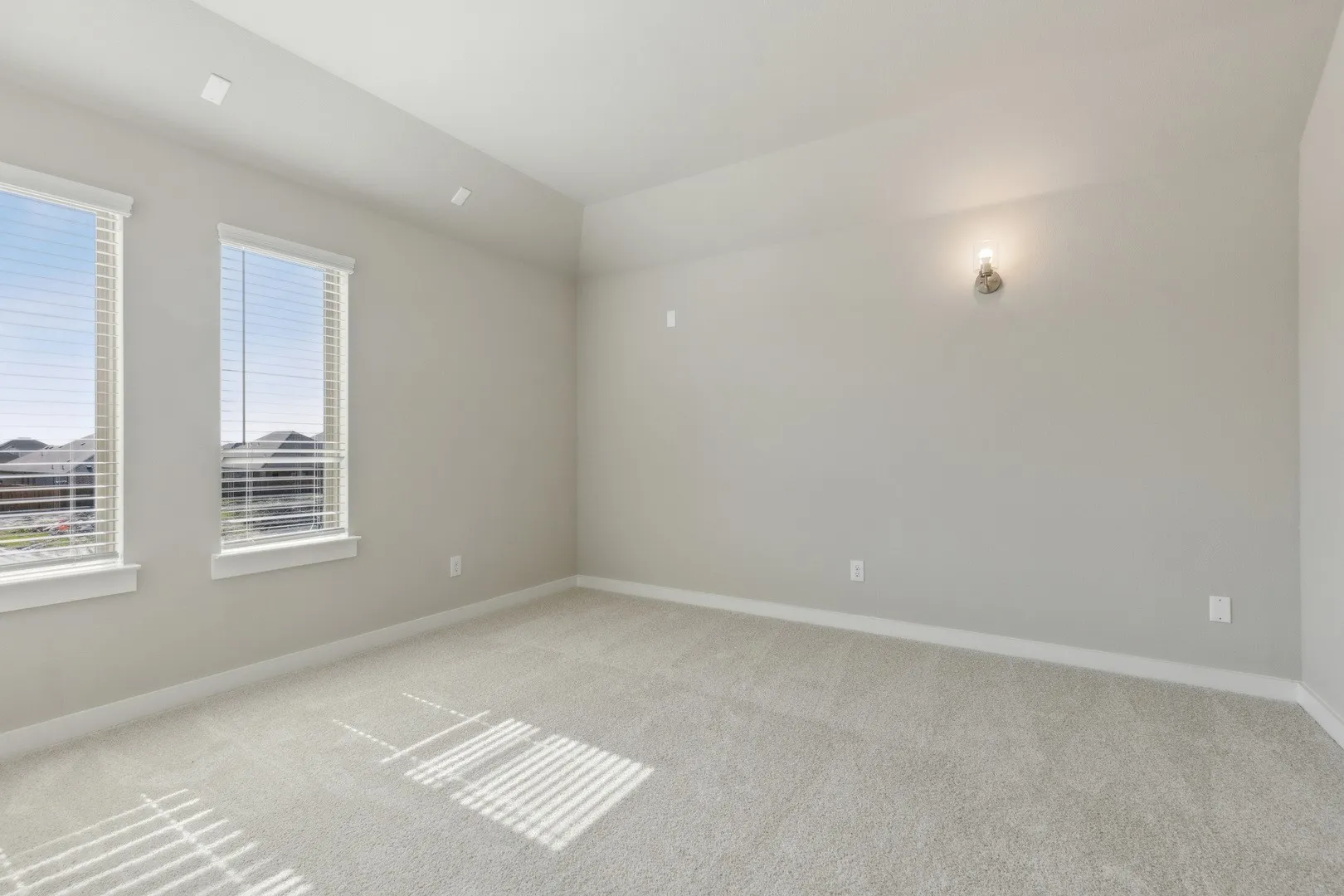 Media Room in the Claret home plan by Trophy Signature Homes – REPRESENTATIVE PHOTO