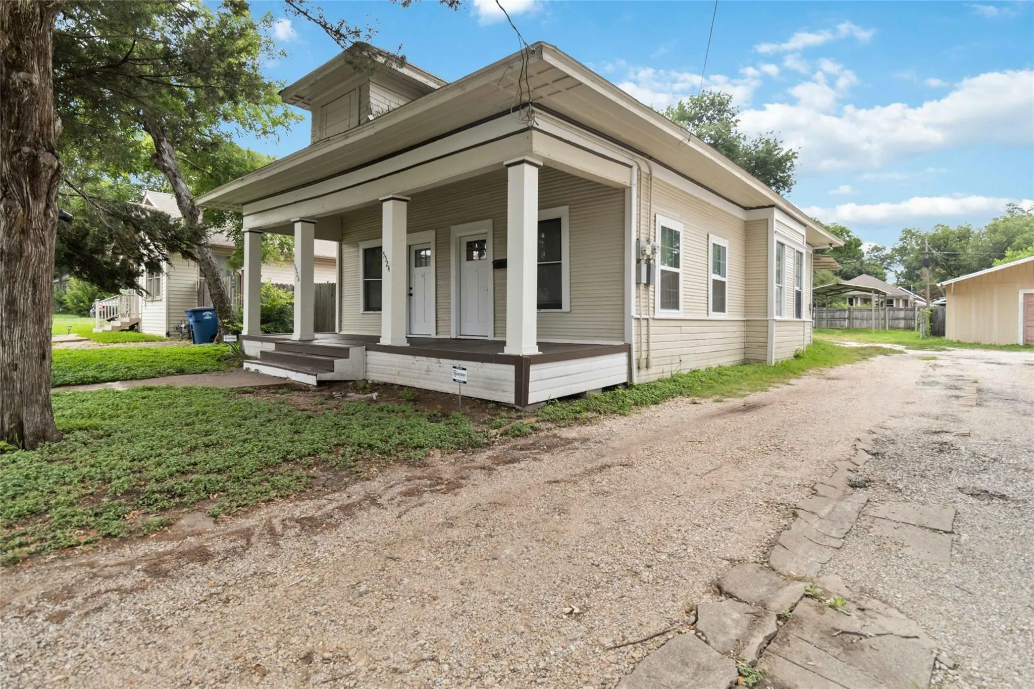 View of front of property featuring a porch
