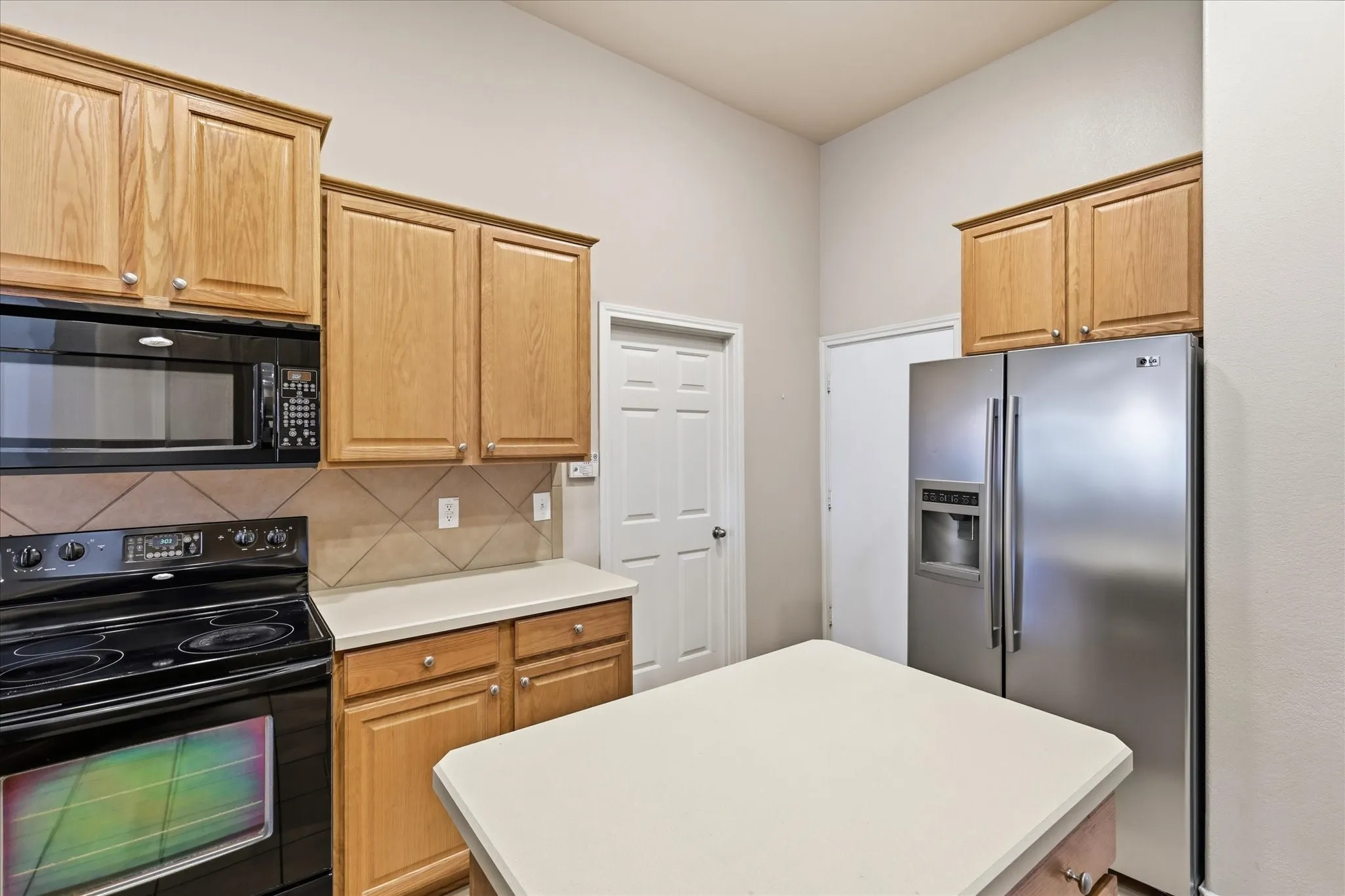 Electric range and built-in microwave