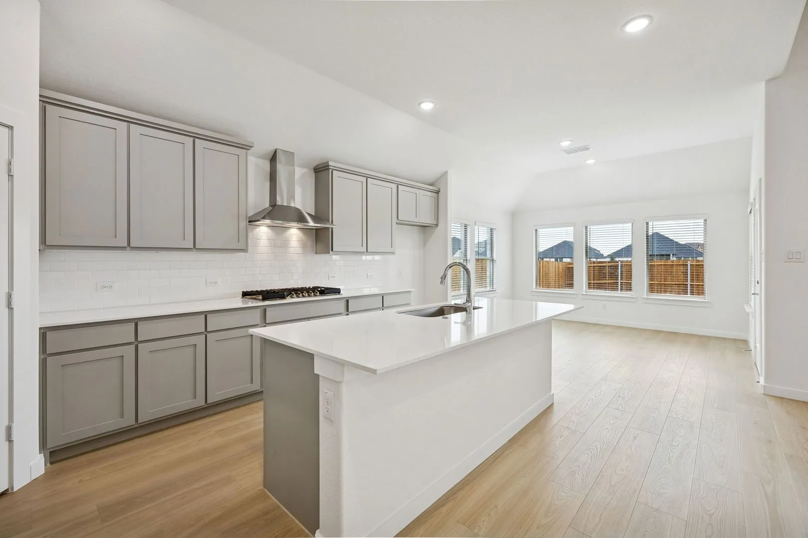 Kitchen in the Gilmour II home plan by Trophy Signature Homes – REPRESENTATIVE PHOTO