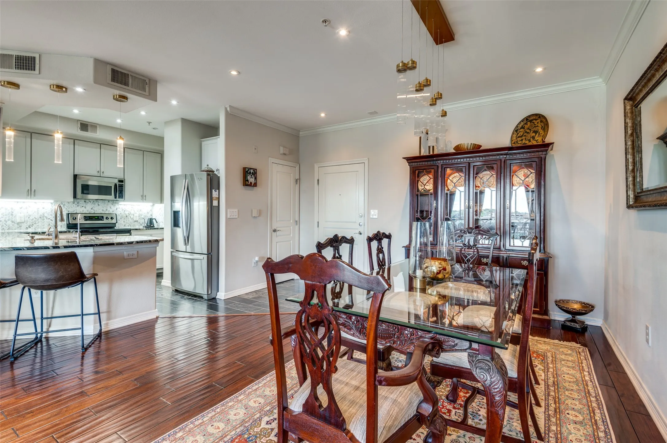 Dining area is adjacent to beautifully updated kitchen