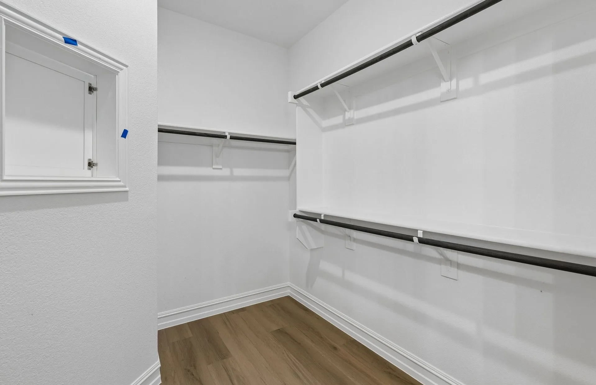 Walk-in closet in primary suite