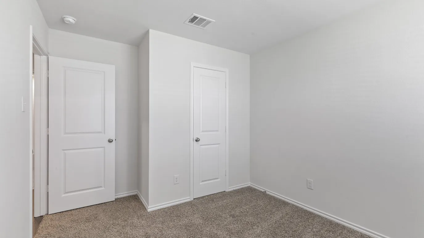 Neutral-toned carpeting complementing light-colored walls