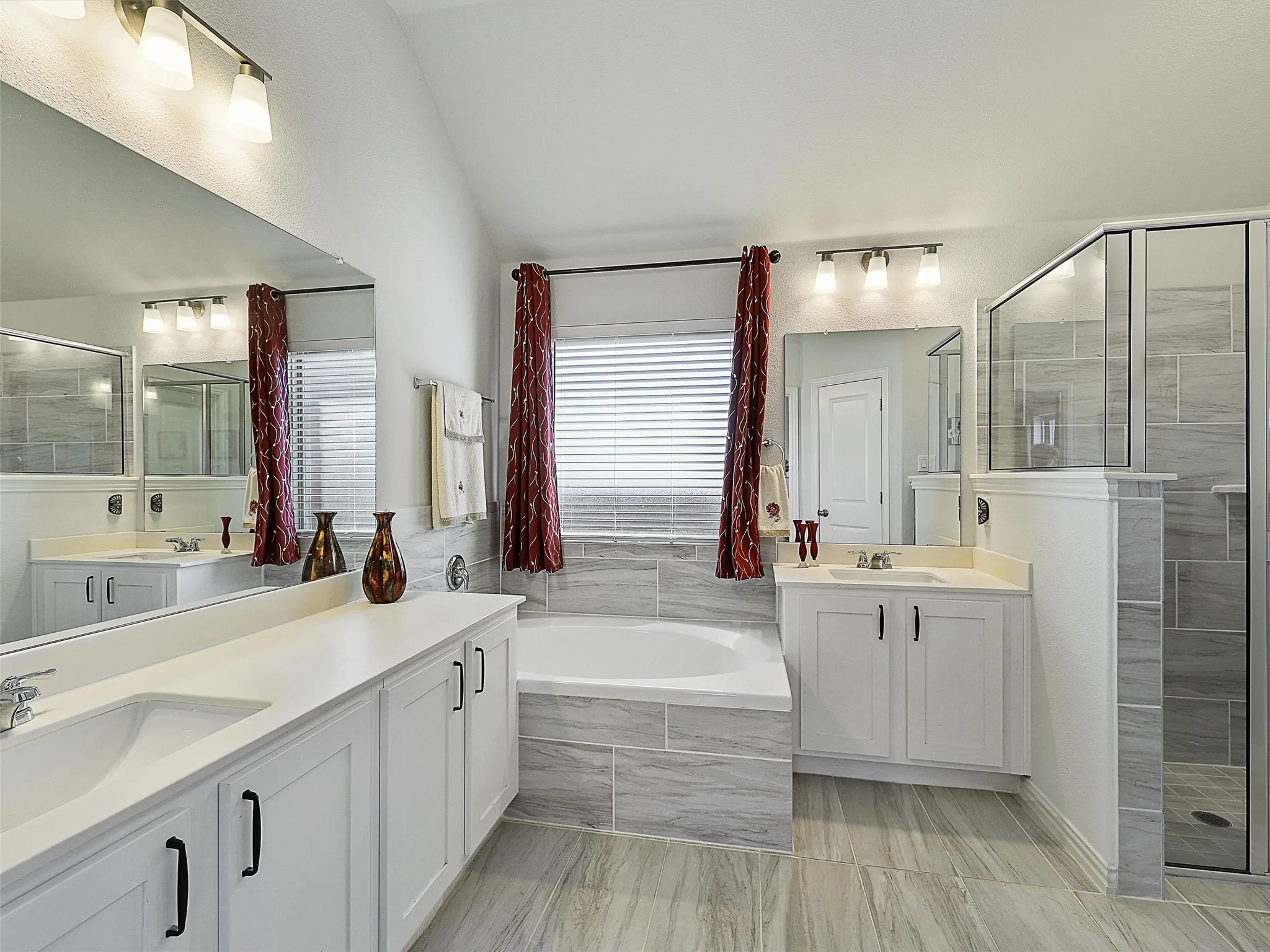 Primary bathroom with separate tub and shower