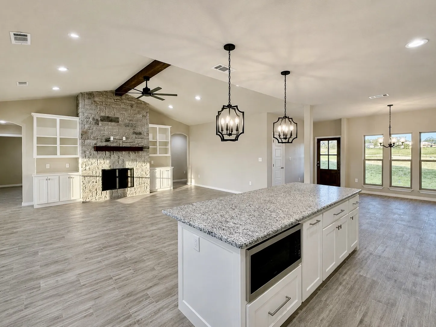 Kitchen is open to the living room and dining space