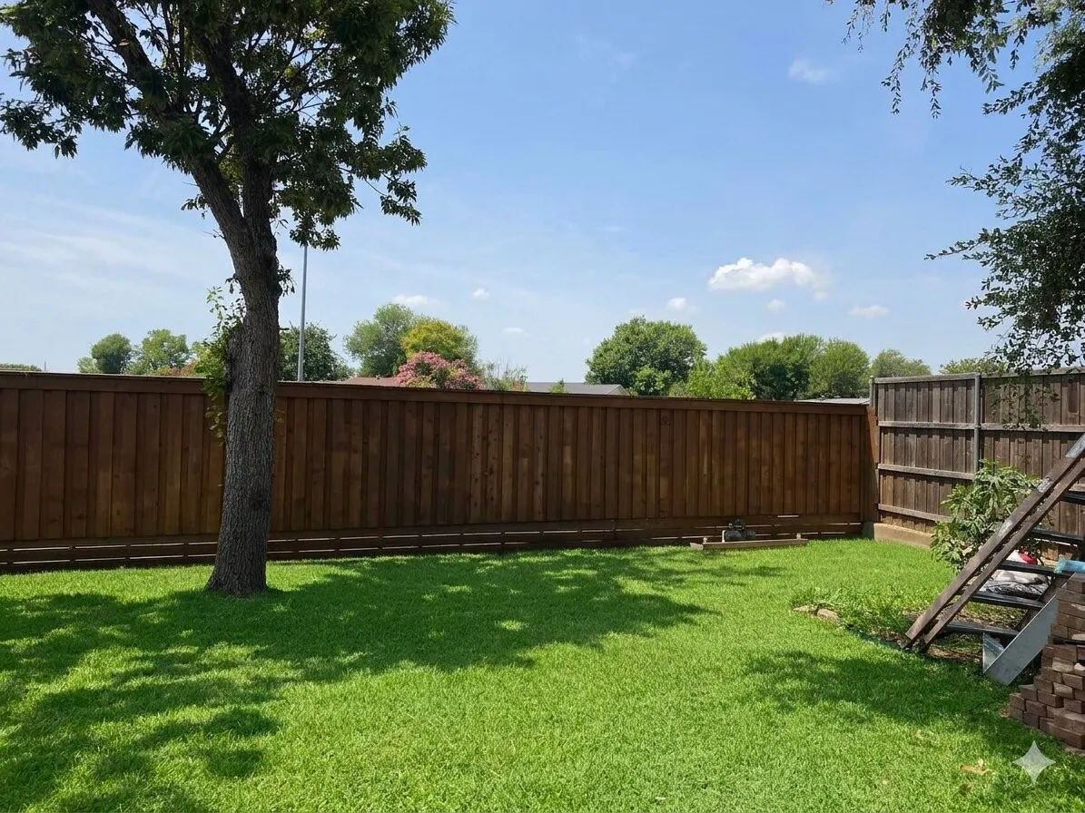 Expansive backyard featuring a manicured lawn and mature trees