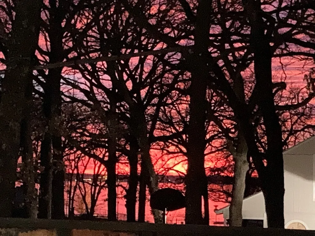 Sunset view from side porch of home