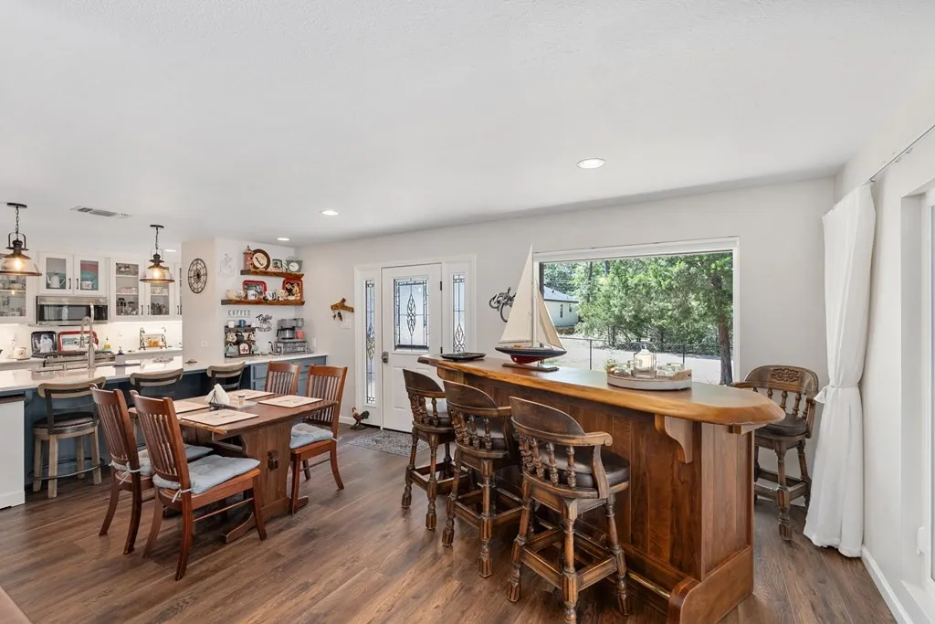Open concept kitchen-dining-living