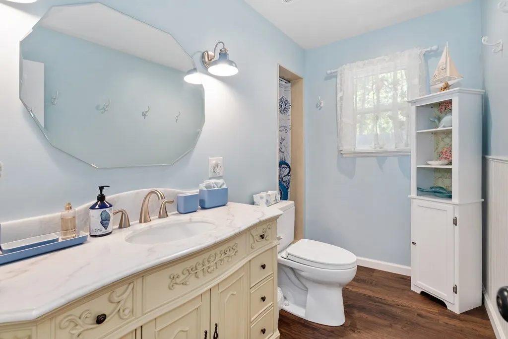 Main bathroom with shower & custom vanity sink