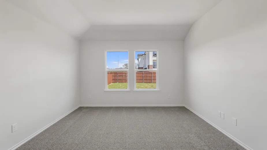 Neutral-toned interior with carpet flooring, white walls, and white trim