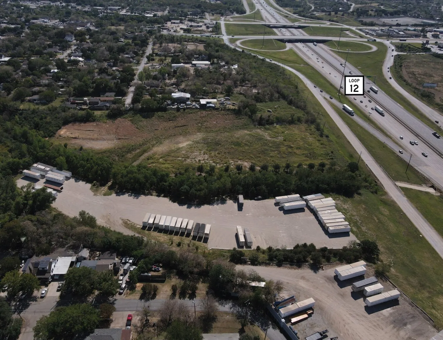 Expansive undeveloped land parcel with direct frontage to a major highway