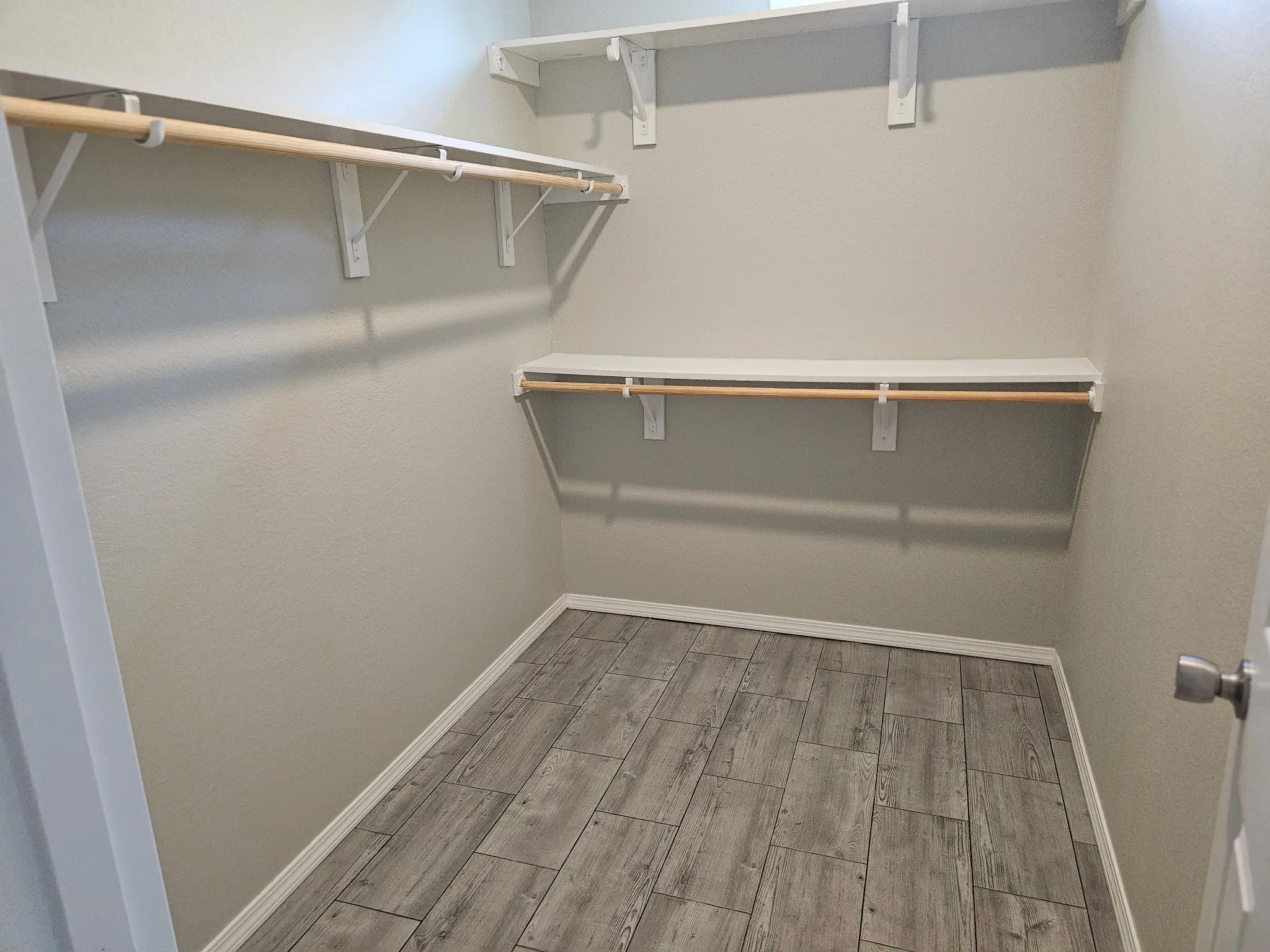 Bedroom 1 walk in closet on Right end of home