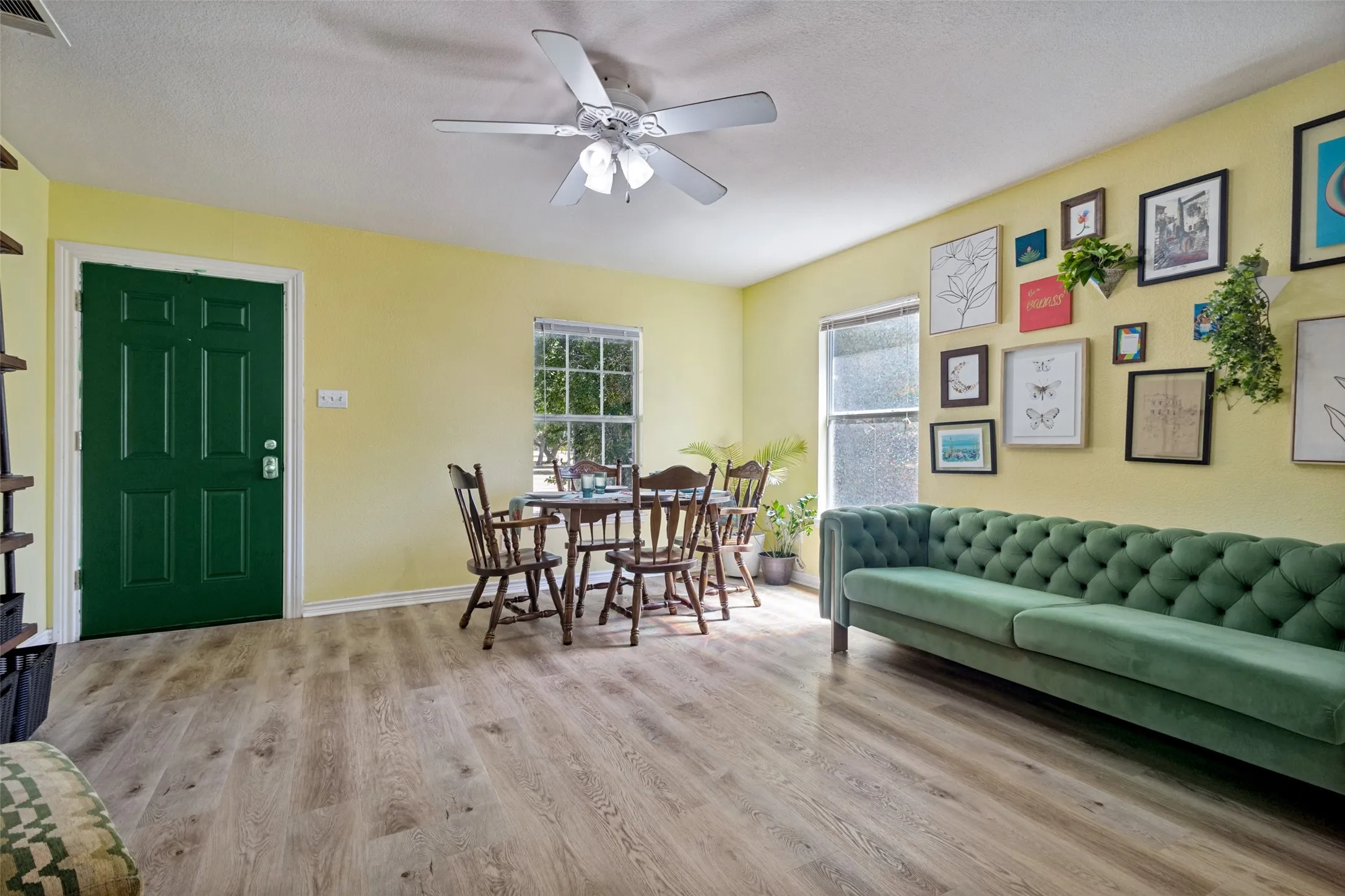 The soft color of the living room walls and the abundant natural light greet you as you enter the home.
