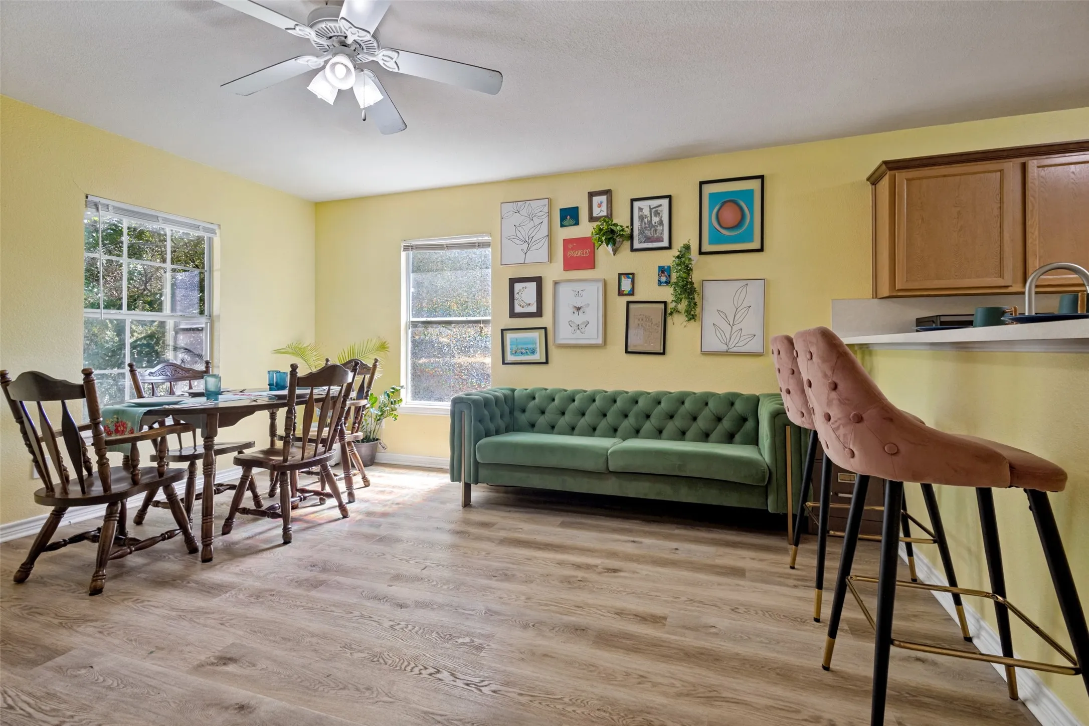The spacious living room has plenty of room for a dining table.