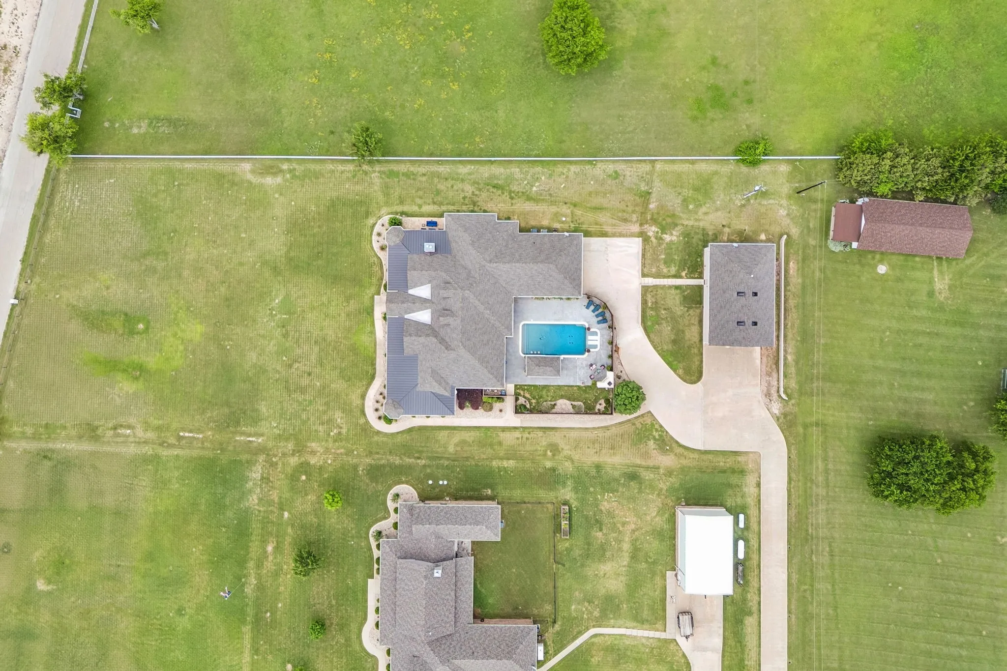 The house is well positioned and elevated appropriately to allow for plenty of space from the road and optimal view of the lake.