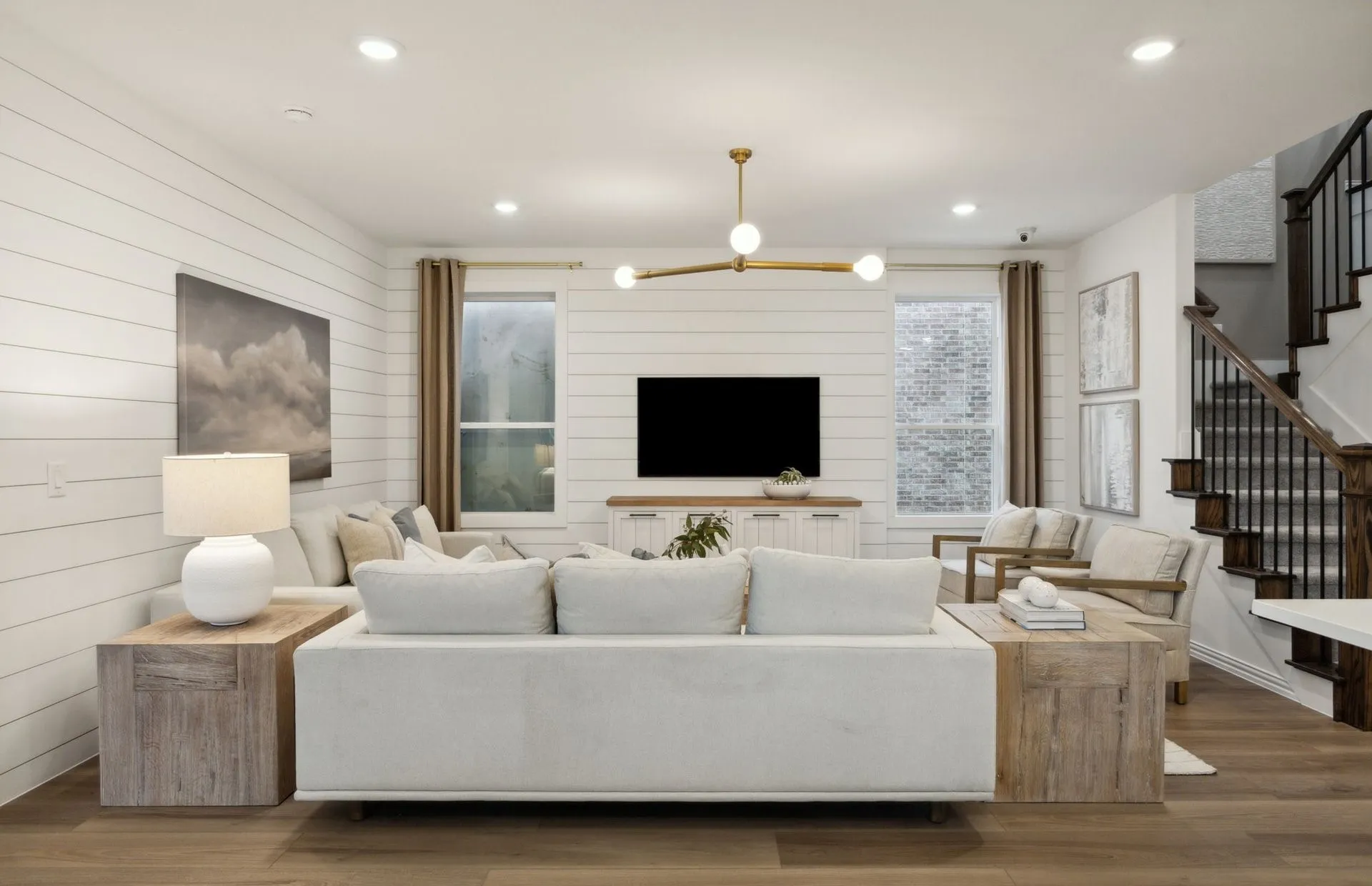 *Model Representation - Gathering room with view of main living areas