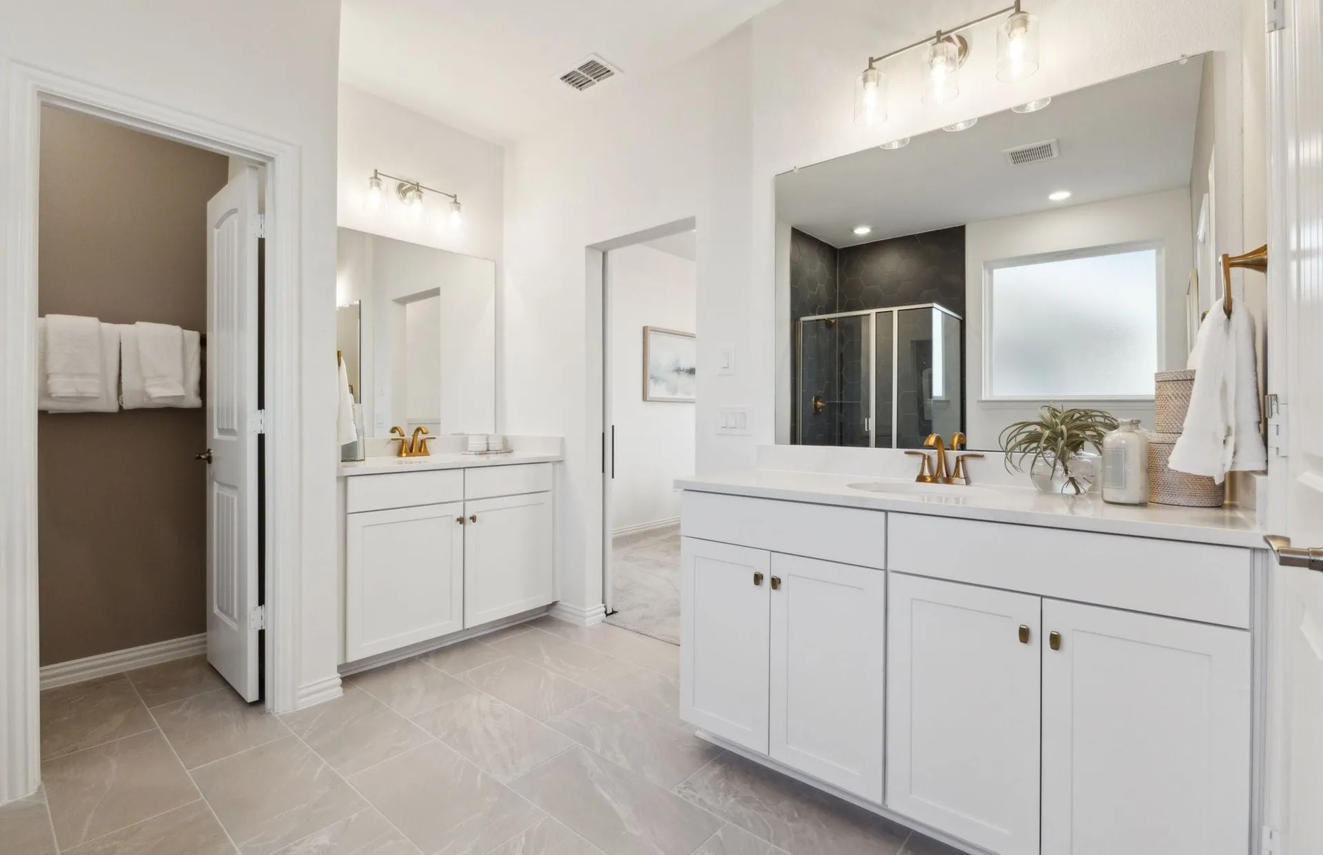 *Model Representation - Owner's private bath separate vanities