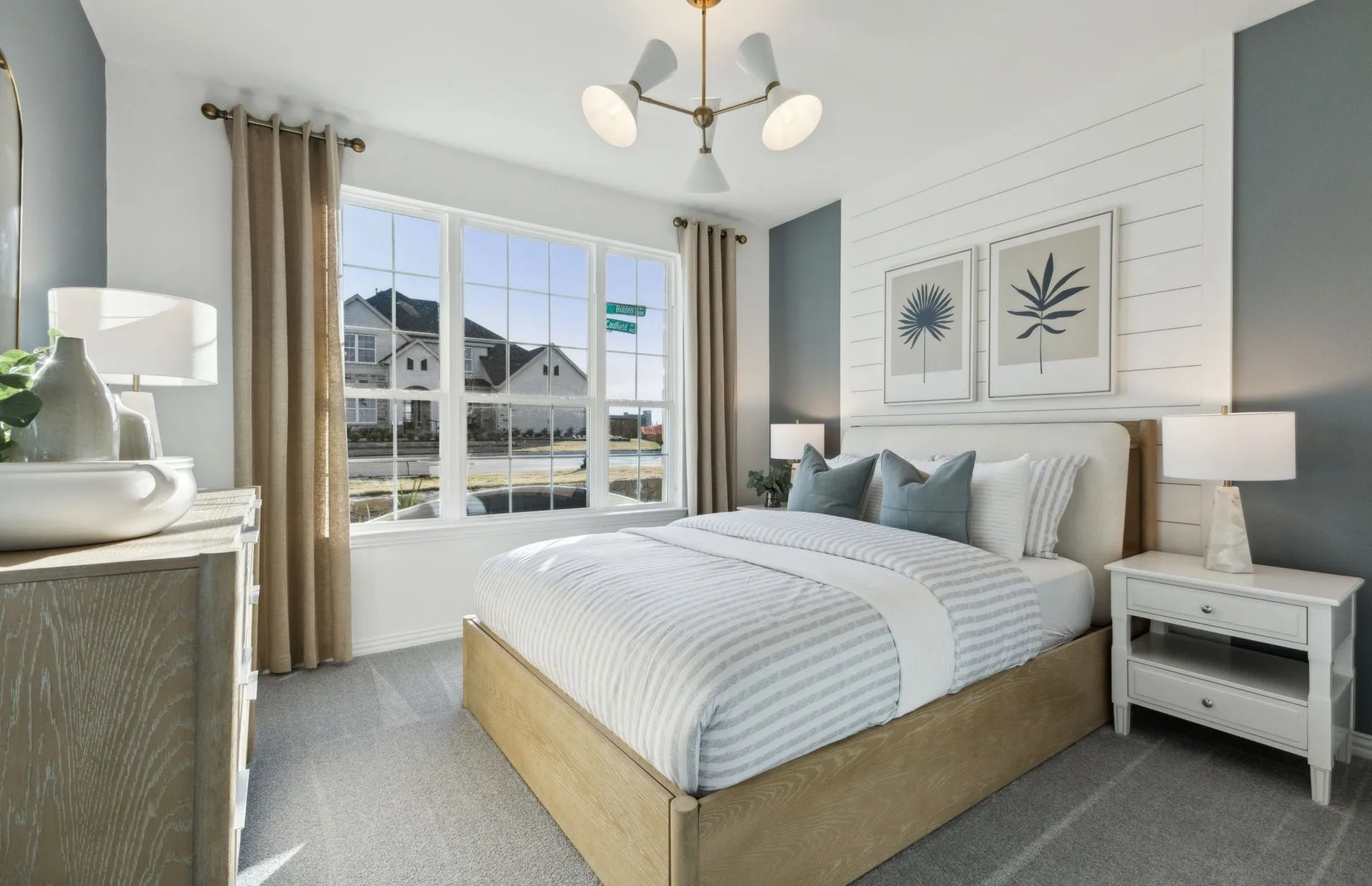 *Model Representation - Spacious secondary bedroom with large windows