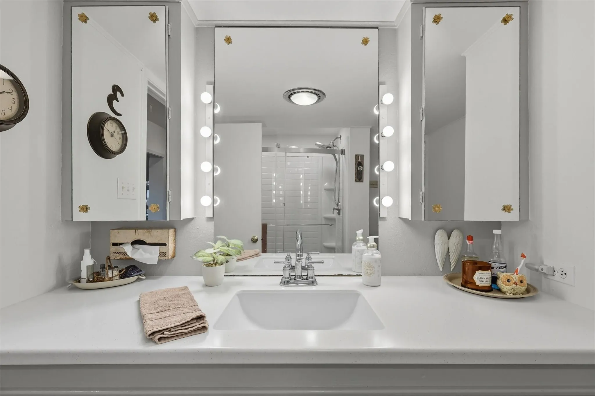 Full bath 2 featuring a stall shower and vanity