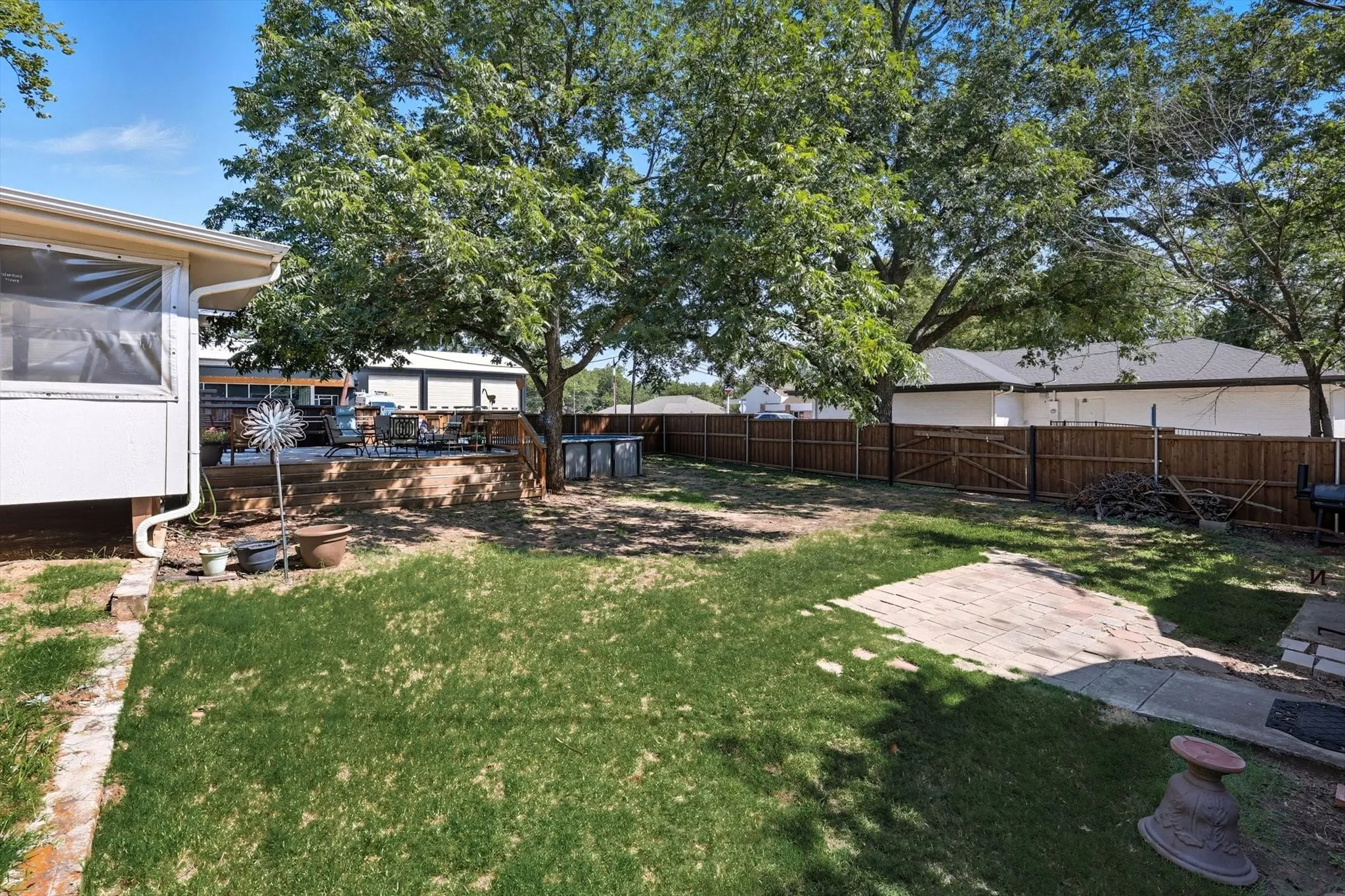 Fenced backyard featuring a patio area