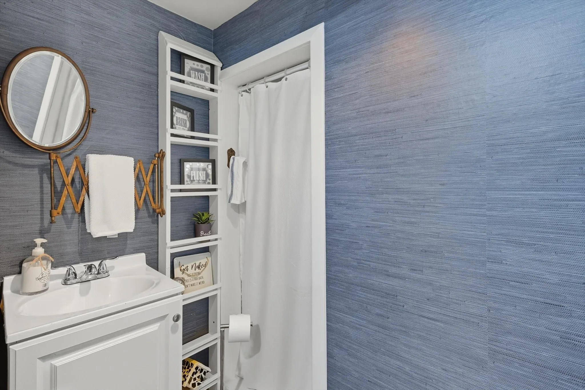 Full Bath #3 along the back entry hallway is great for coming in from outhside.