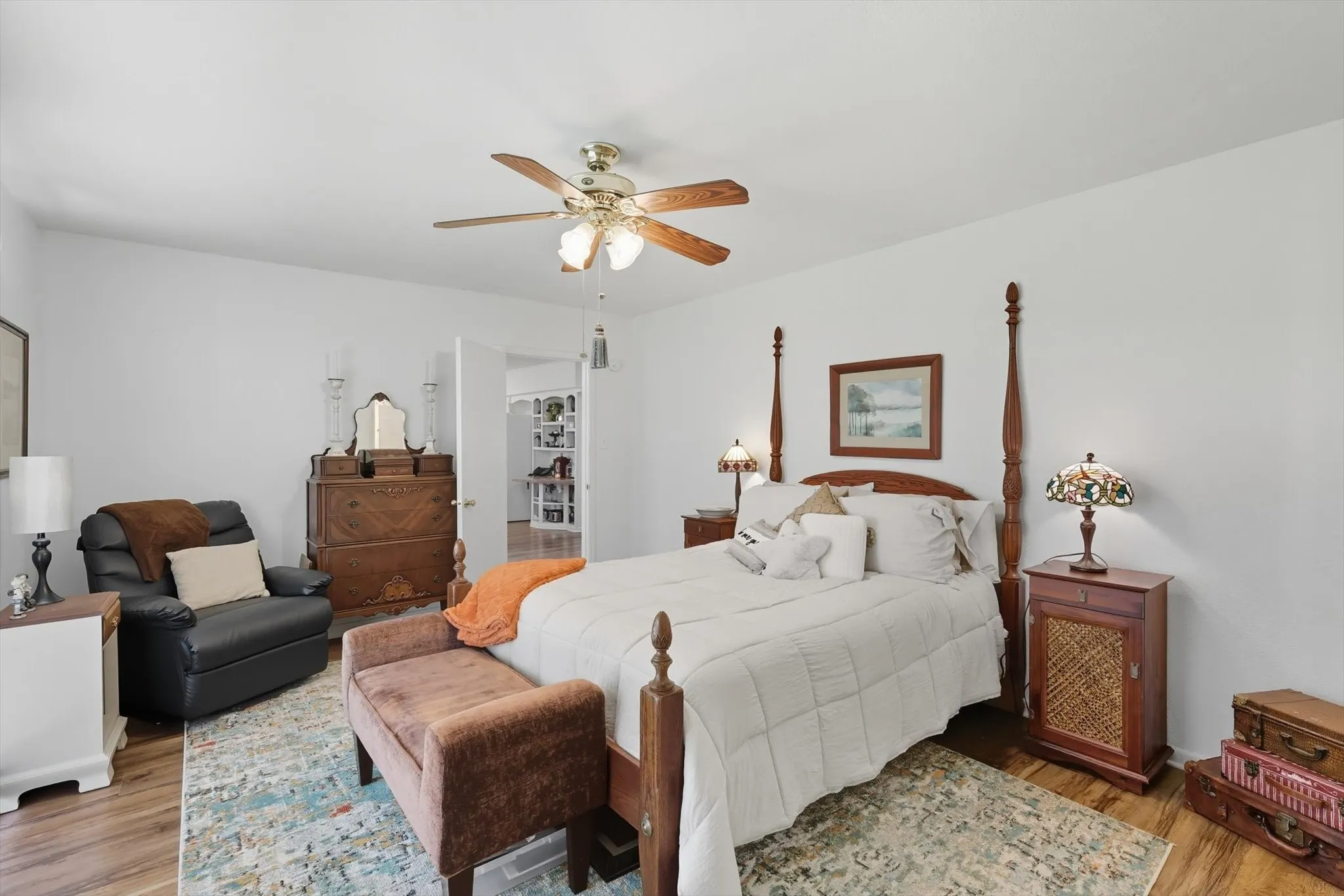 Bedroom with light wood-type flooring and ceiling fan