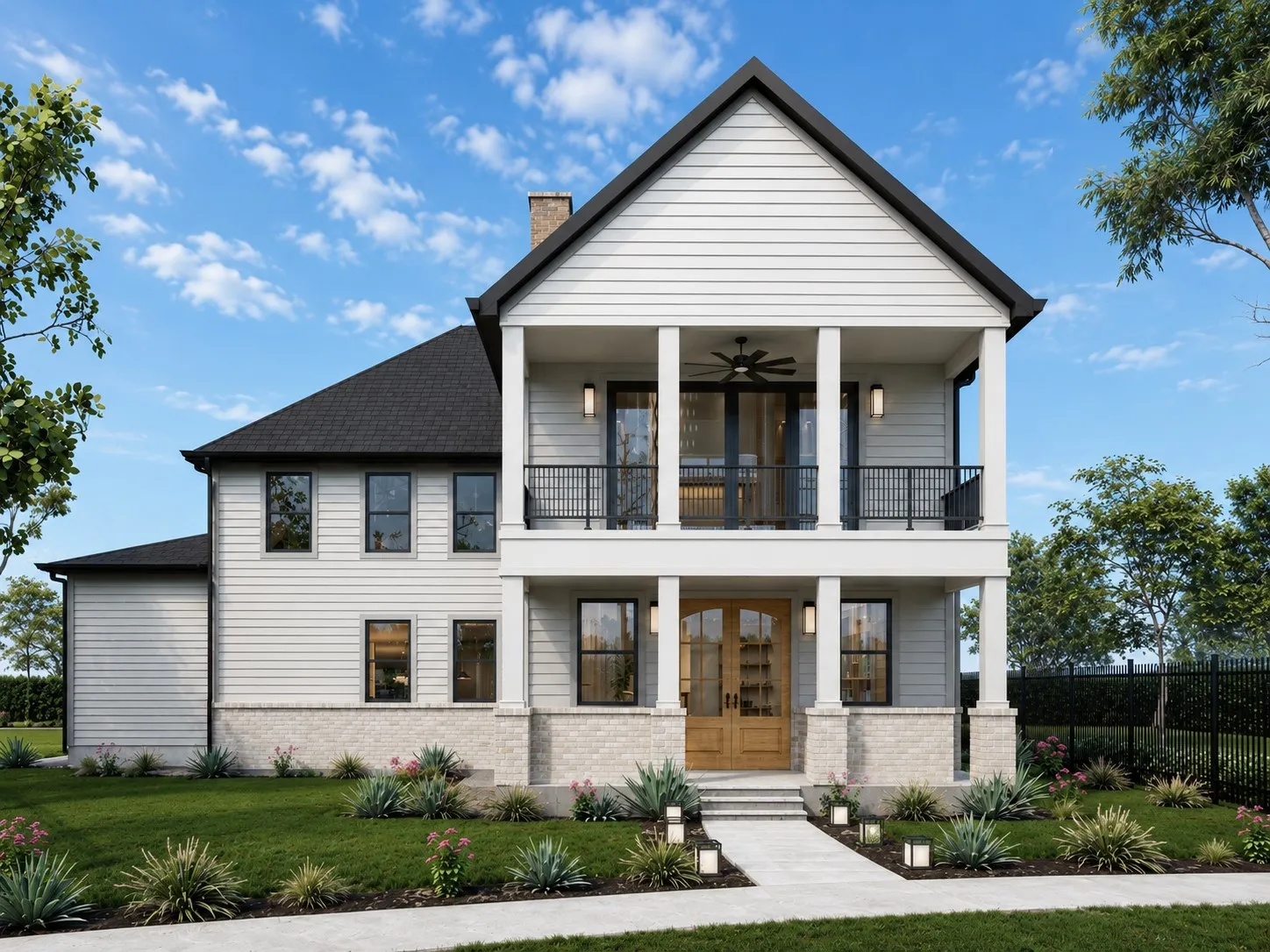 Contemporary farmhouse exterior featuring white siding, a black shingled roof, light brick foundation, a wood-finish double-entry door, and a second-story covered balcony with black iron railings
