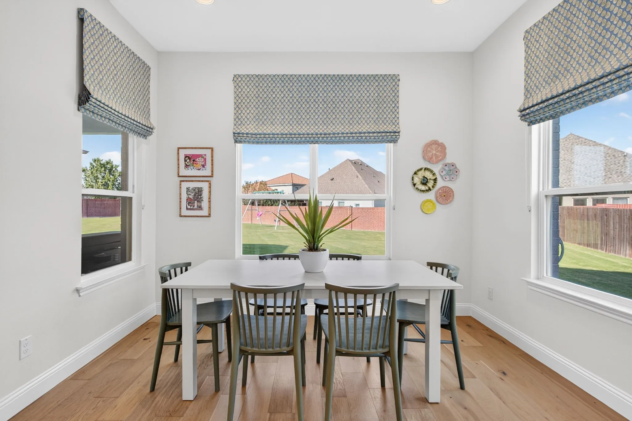 Breakfast nook overlooks the enormous backyard.