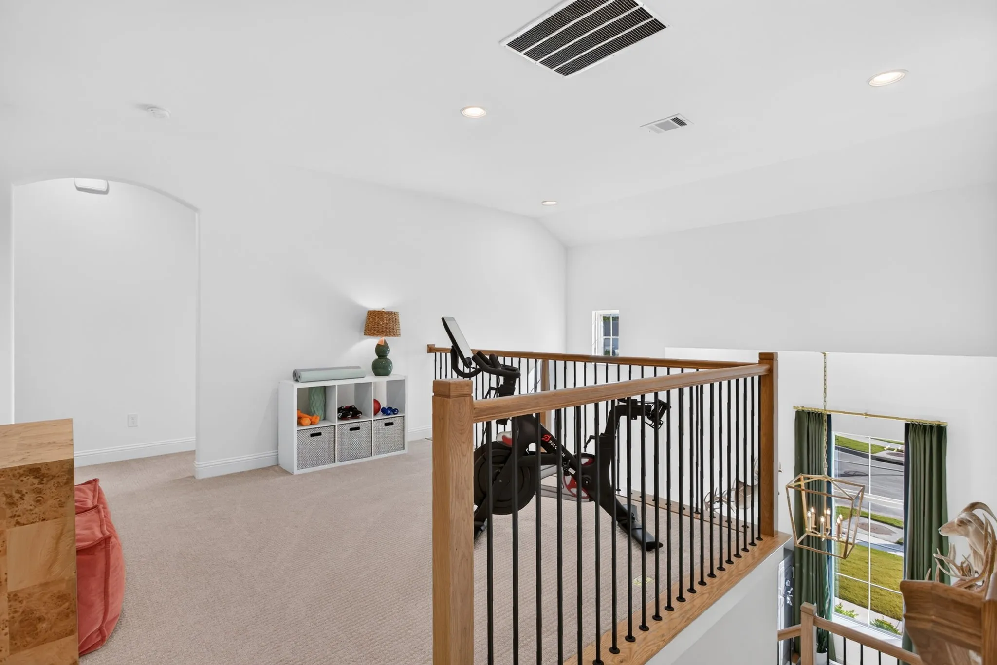 Flex space for exercise equipment, reading or homeschool space or play area.
