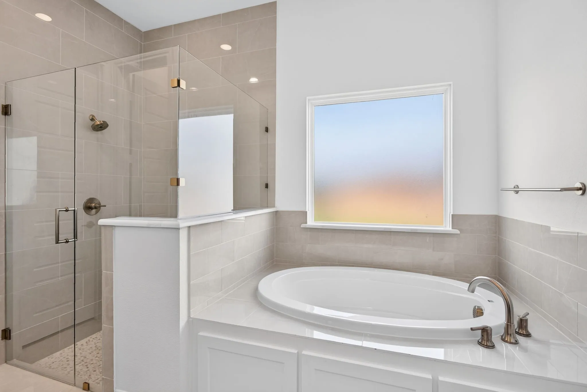 Large bathtub and separate shower.