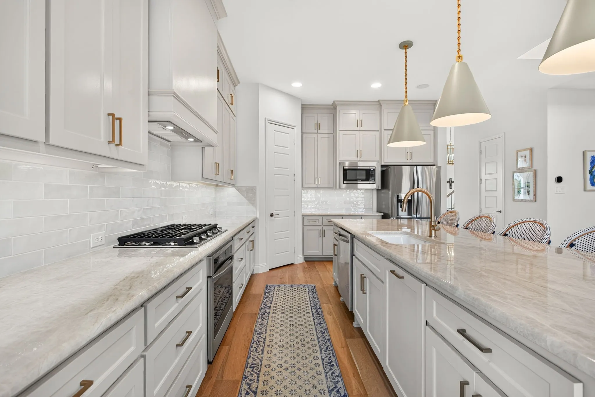 Gas cooking.  White single basin sink.