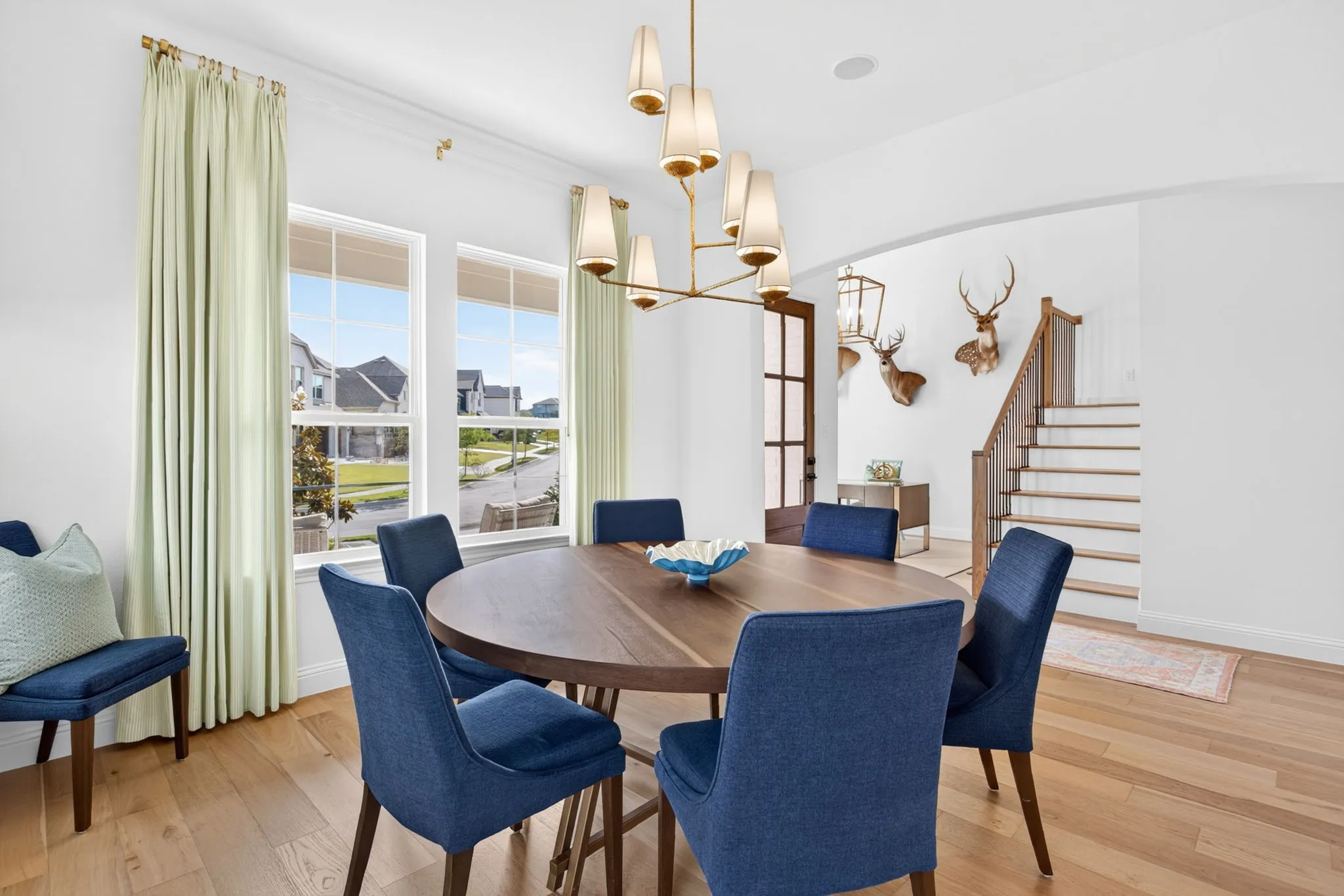 Formal dining is bright and beautiful.  this space could also flex as a sitting room or additional office space.