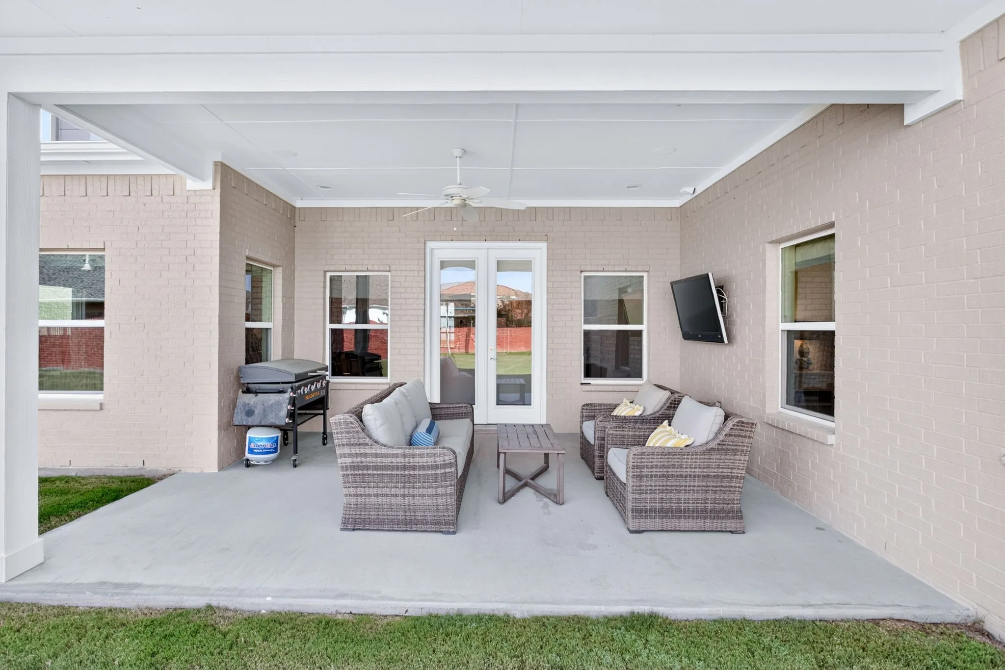 Back patio is generously sized and ready for your grill and outdoor furniture.