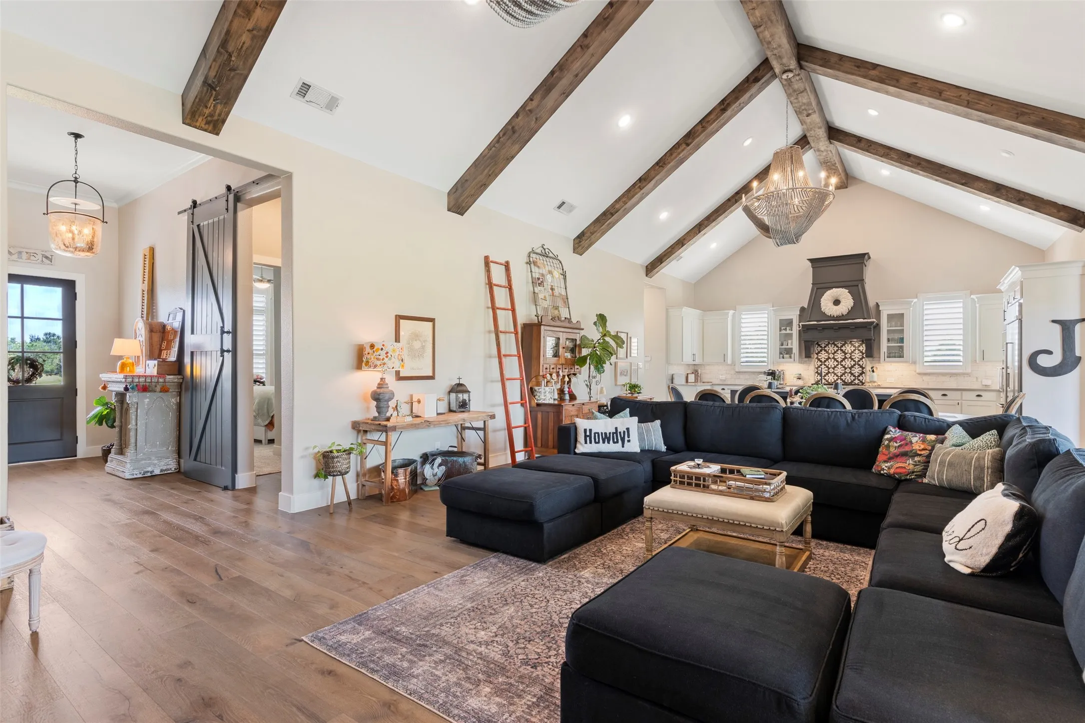 Cathedral ceilings add a grand architectural scale and a spacious feel.