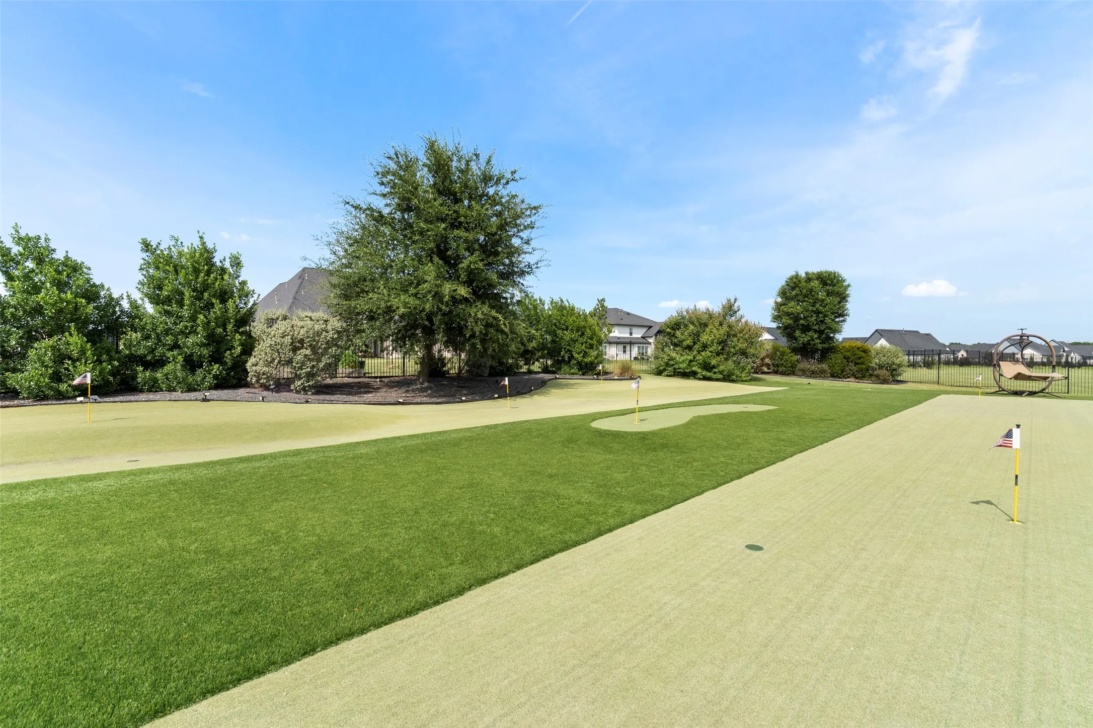 Perfect your short game right at home with a premium, low-maintenance backyard putting green.