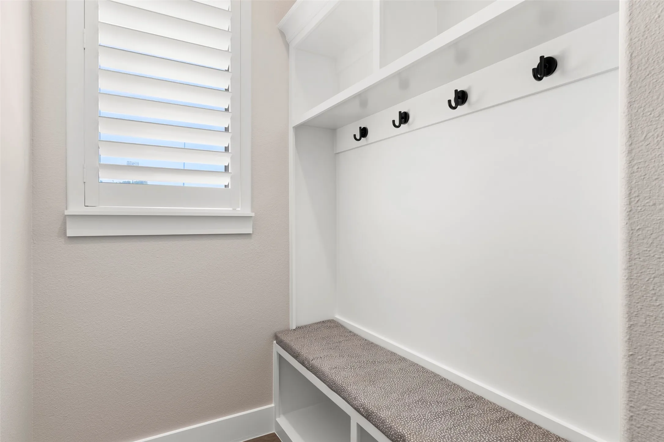 The mud room is located at the garage entry.  Keeps daily outdoor gear organized and tucked away from the main living areas.