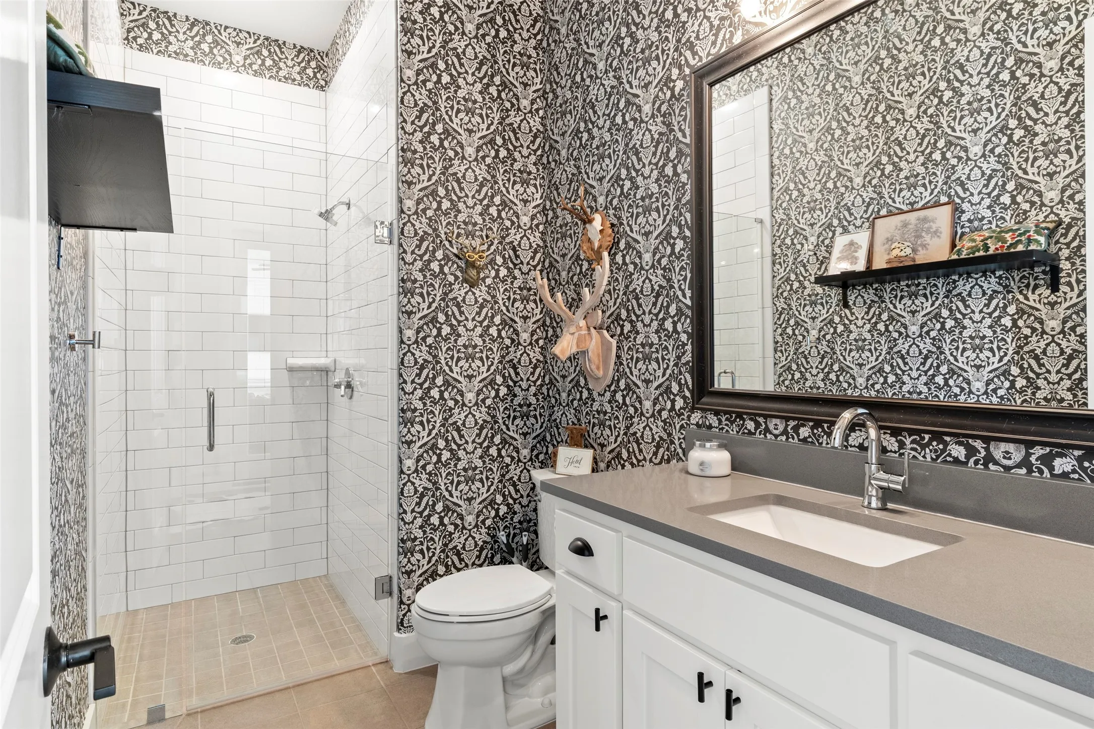 Located near the outdoor space for convenience as a pool bath.