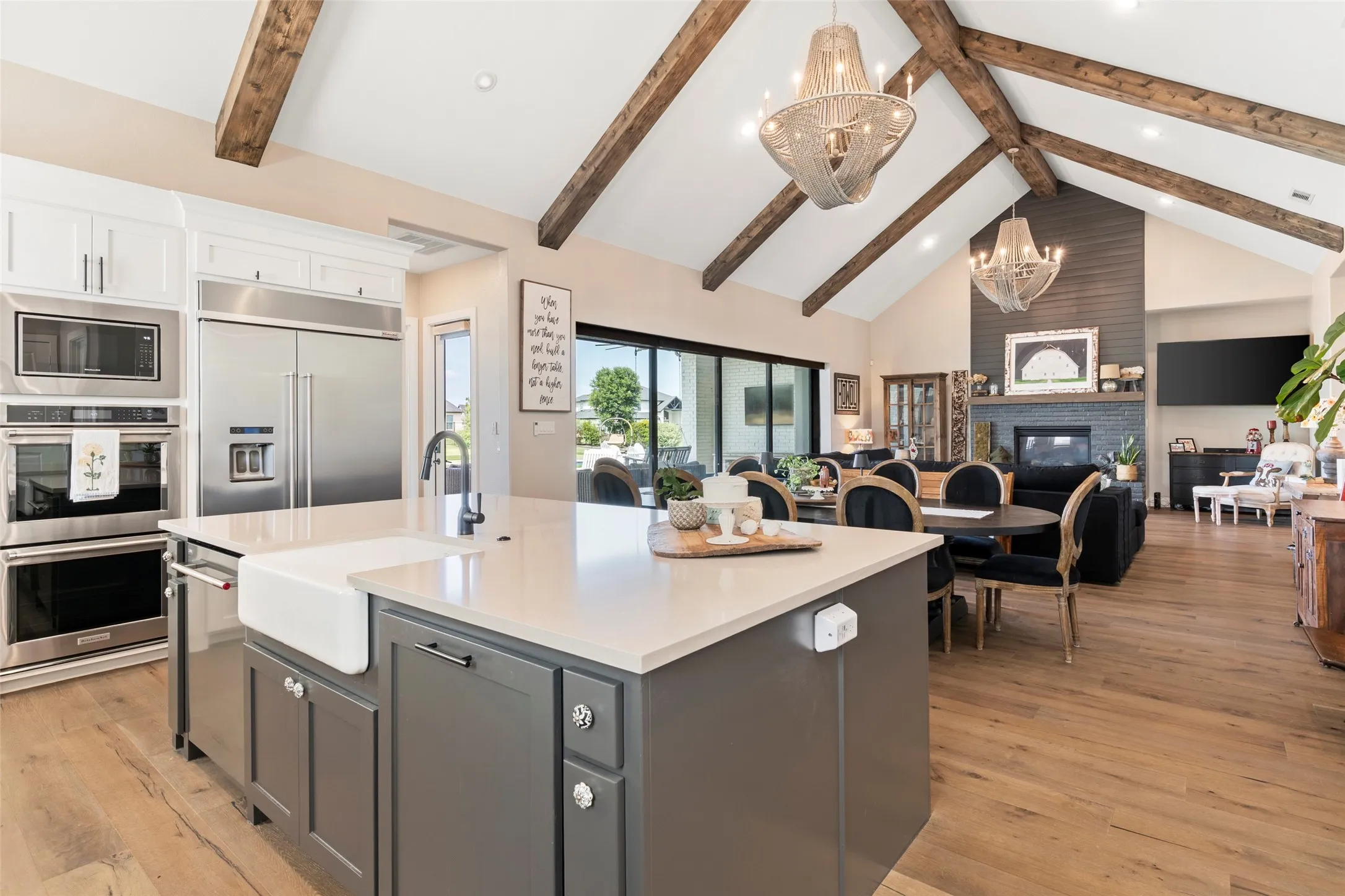 Kitchen, dining, and living areas flow together without walls for maximum connectedness.
