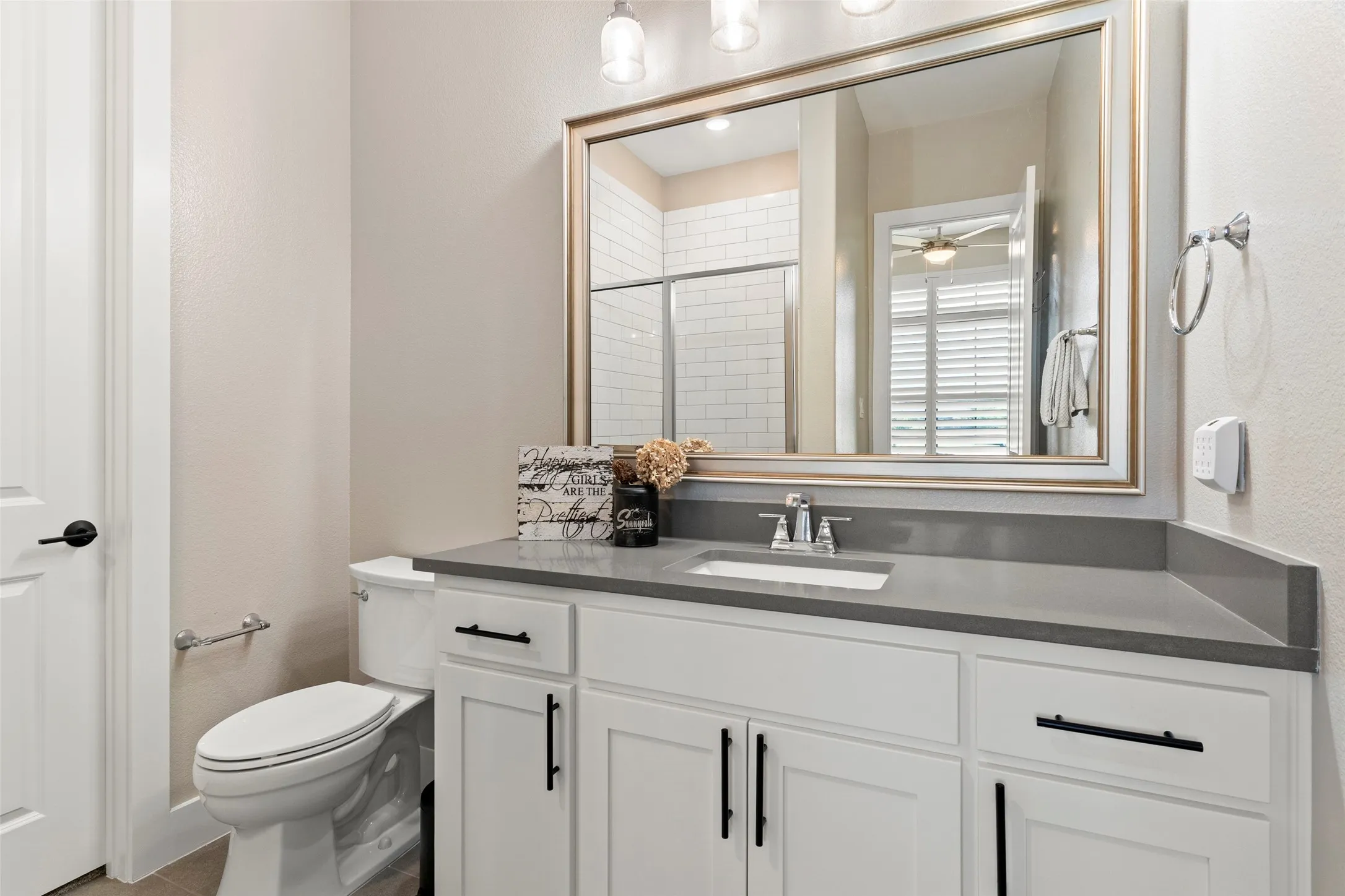 Ensuite bath #3 with shower and walk-in closet.