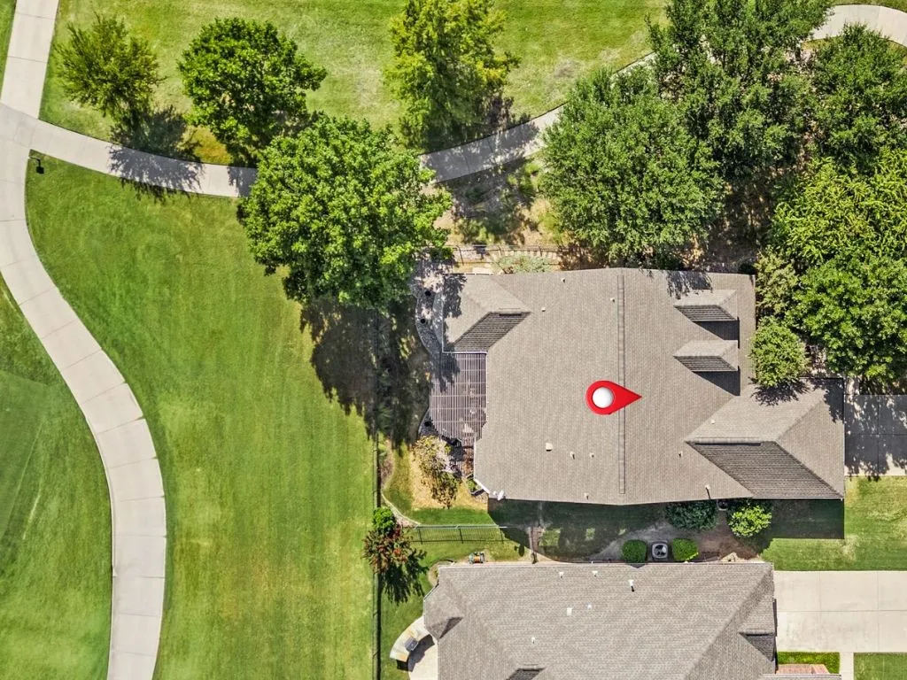 Mature Landscaping with Open View of Golf Course
