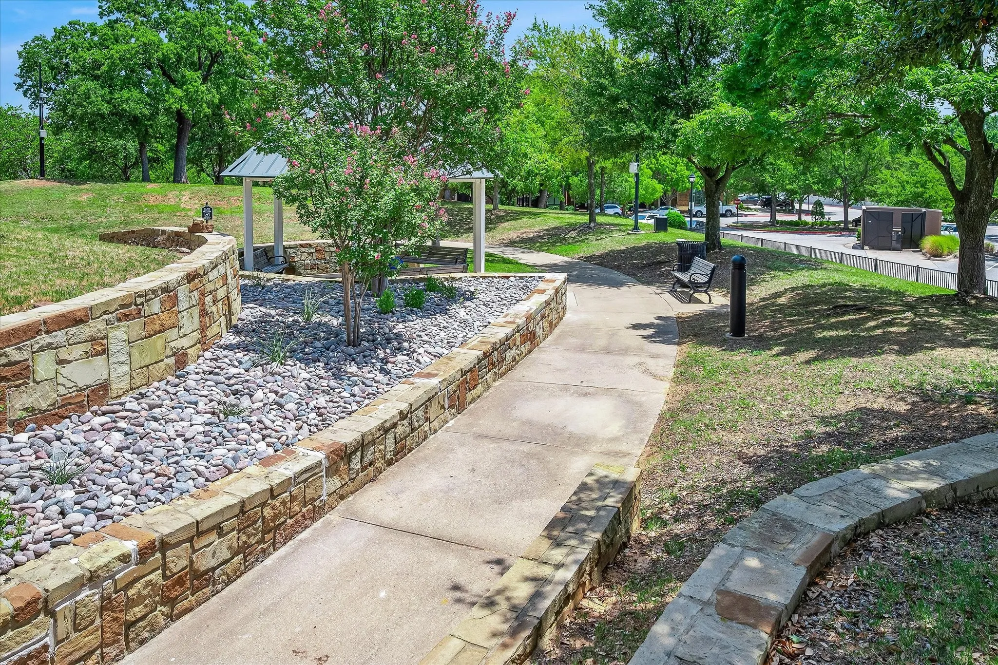 Gazebo at the top of the hill in the park across the street from your home. Benches throughout the park and town square to relax and enjoy time outside.