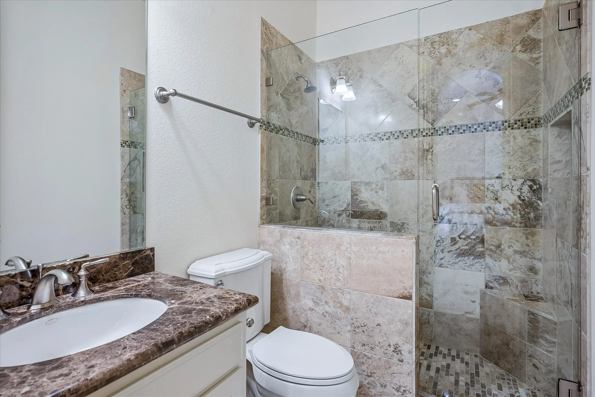 Second floor en suite full bathroom with large stone walk in shower.