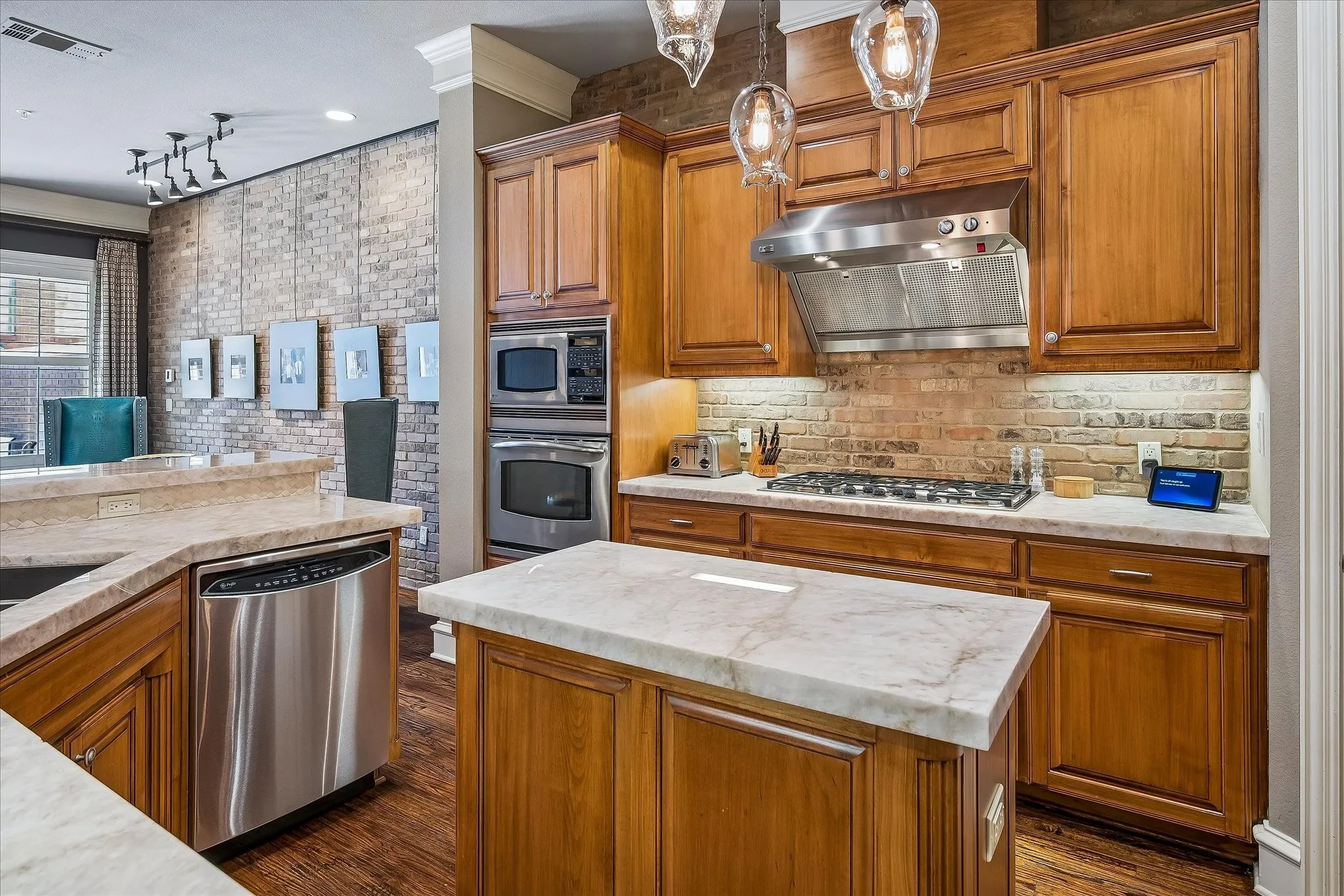 Beautiful stained cabinetry with under counter lighting.