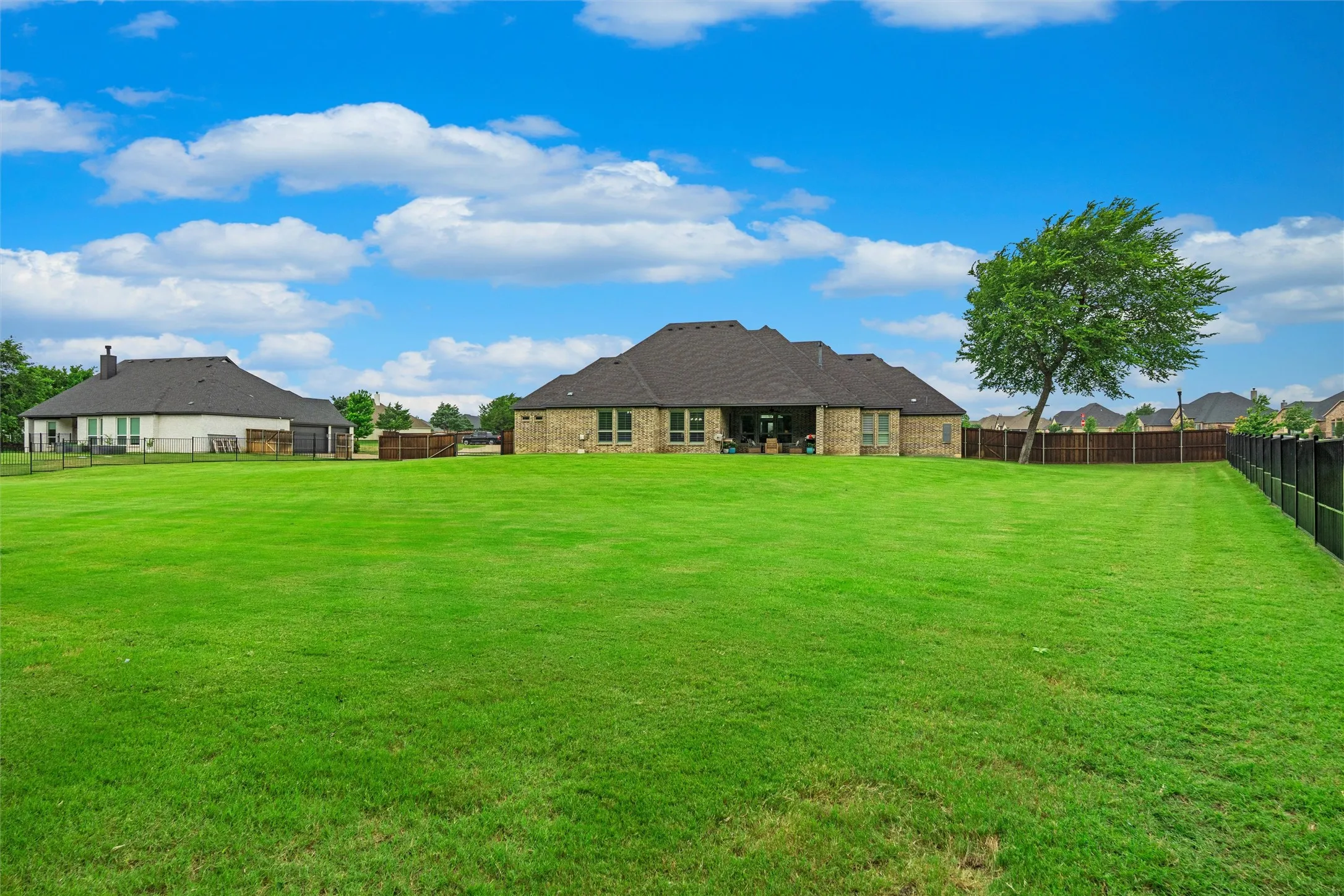 Fully sodded with bermuda grass and regulary fertilized, this backyard is ready for you to enjoy with a beautiful canvas to make you backyard dreams come true!