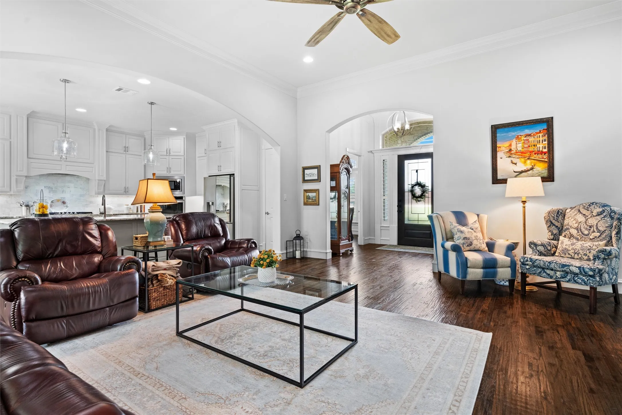 View from the fireplace area to the entrance. Notice those gorgeous wood floors!