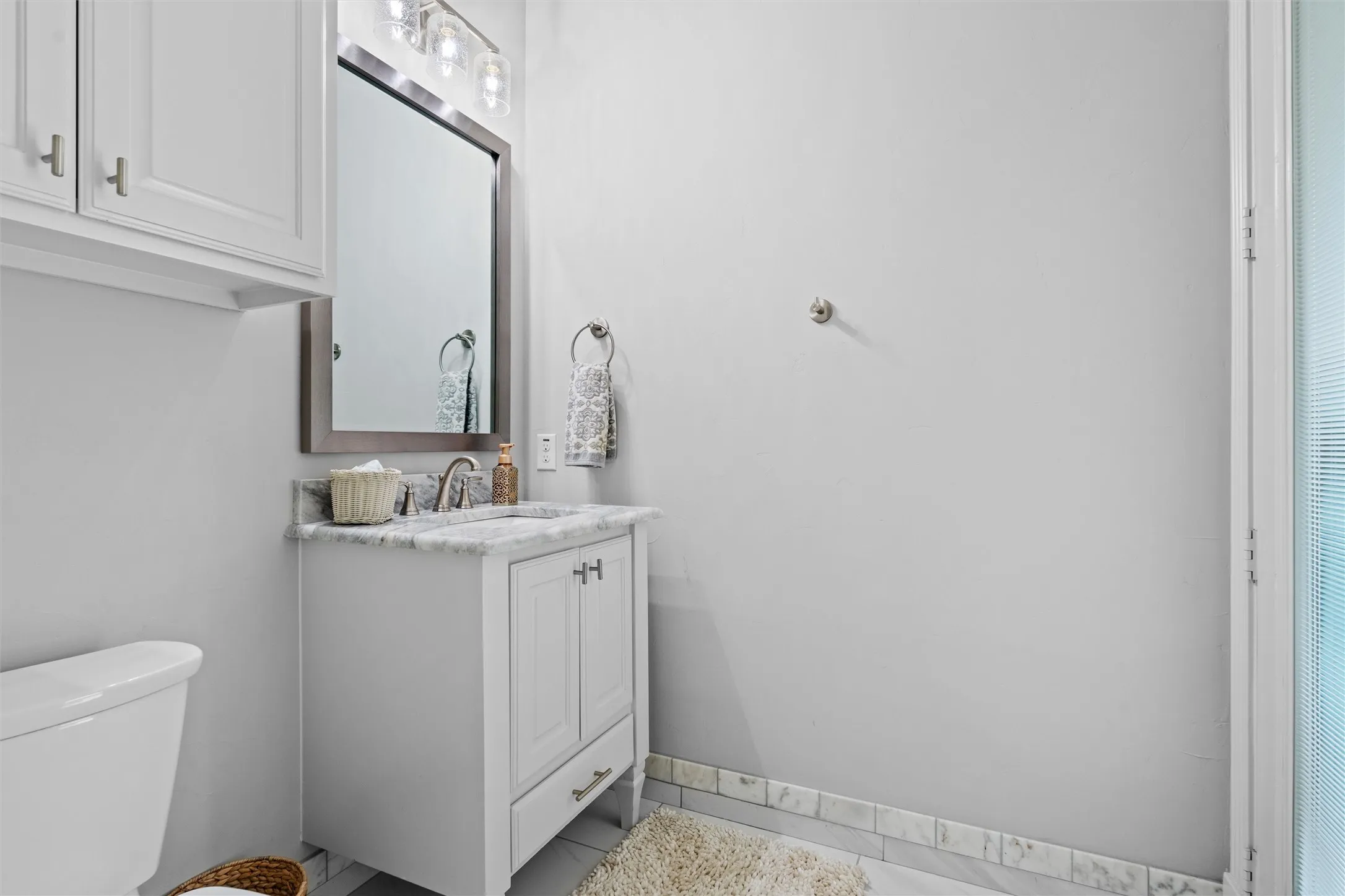 Half bath that exits to the back porch