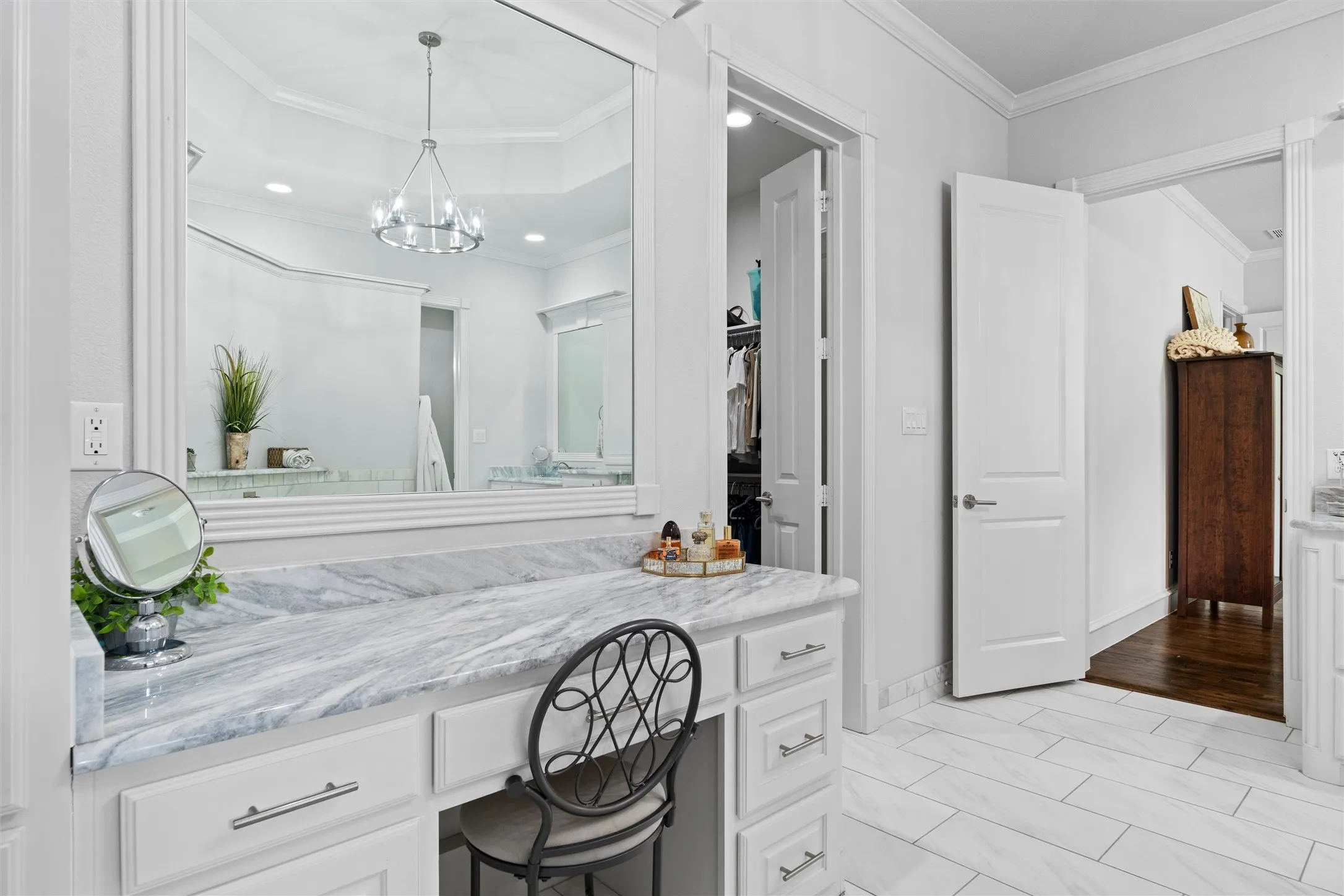 The other side offers a side down vanity area with plenty of counter space and drawers.