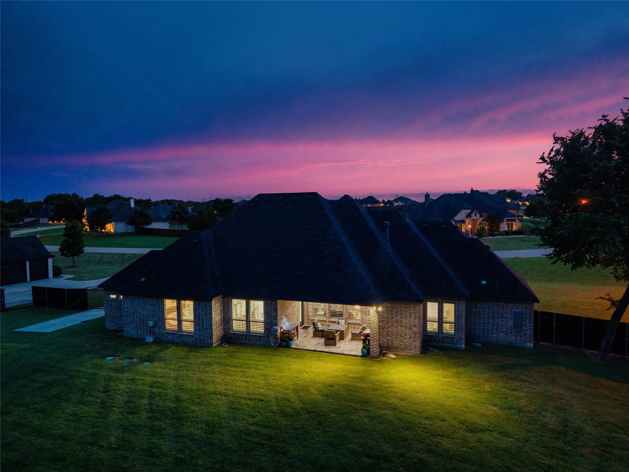 Come home and enjoy the gorgeous view of the pink skies at night